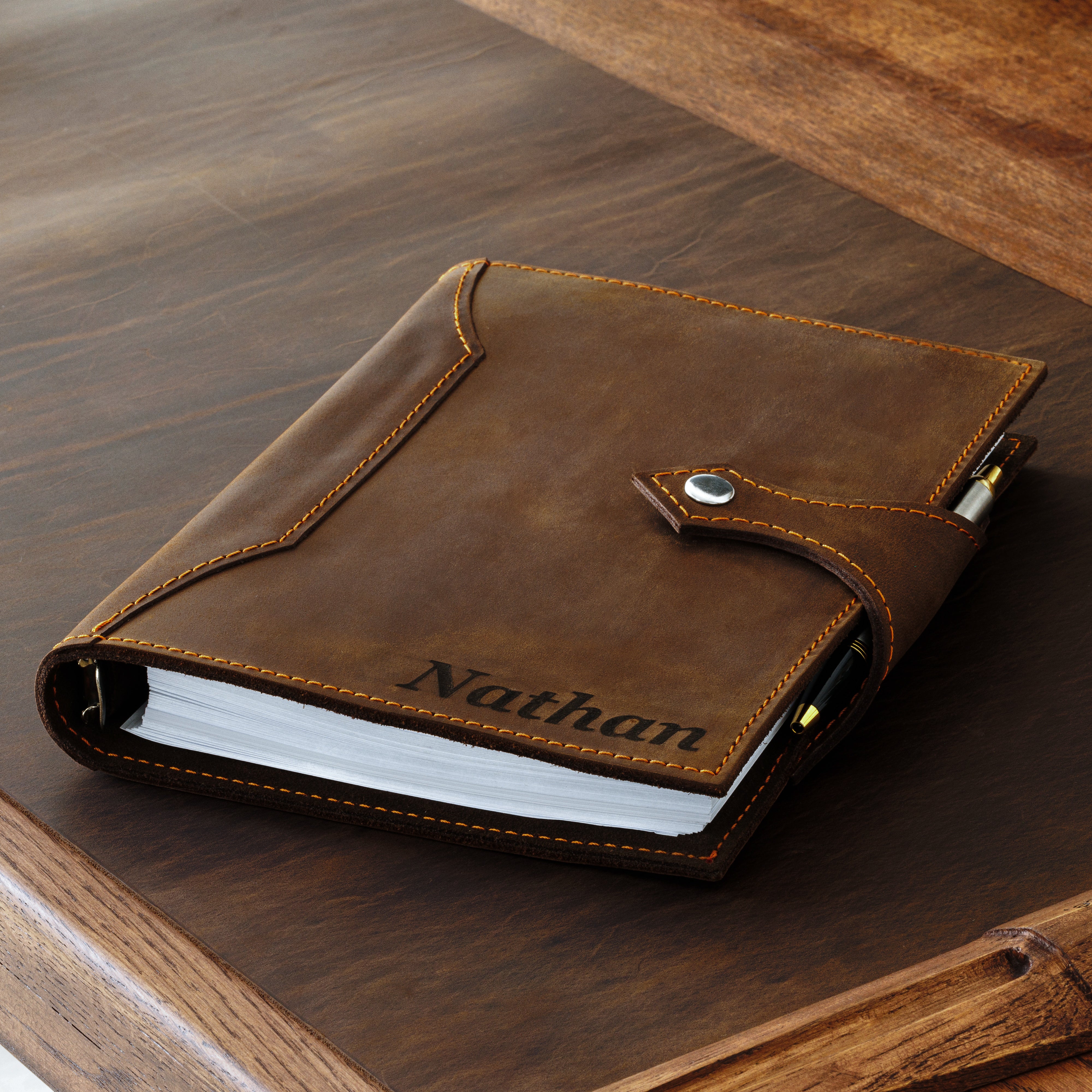 Brown leather business notebook Mureli with tail strap and personalized initials