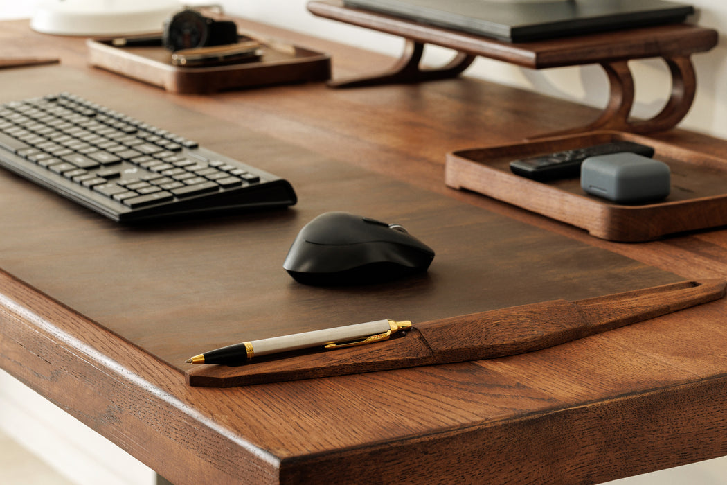 Desktop setup with matching wooden monitor riser and tray