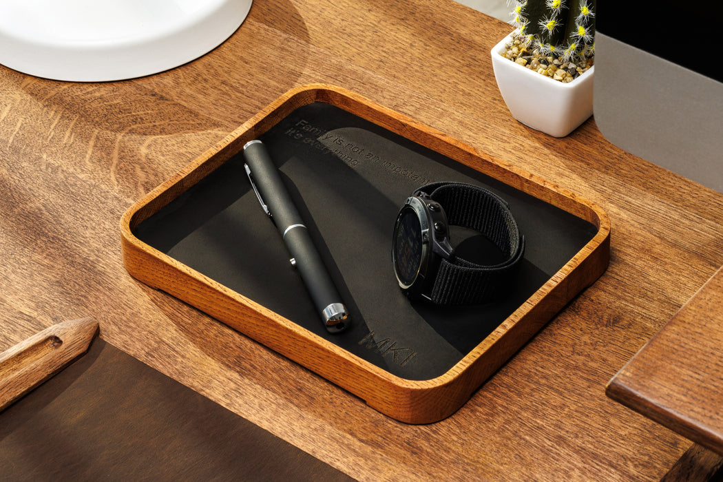 Walnut monitor stand with matching tray below