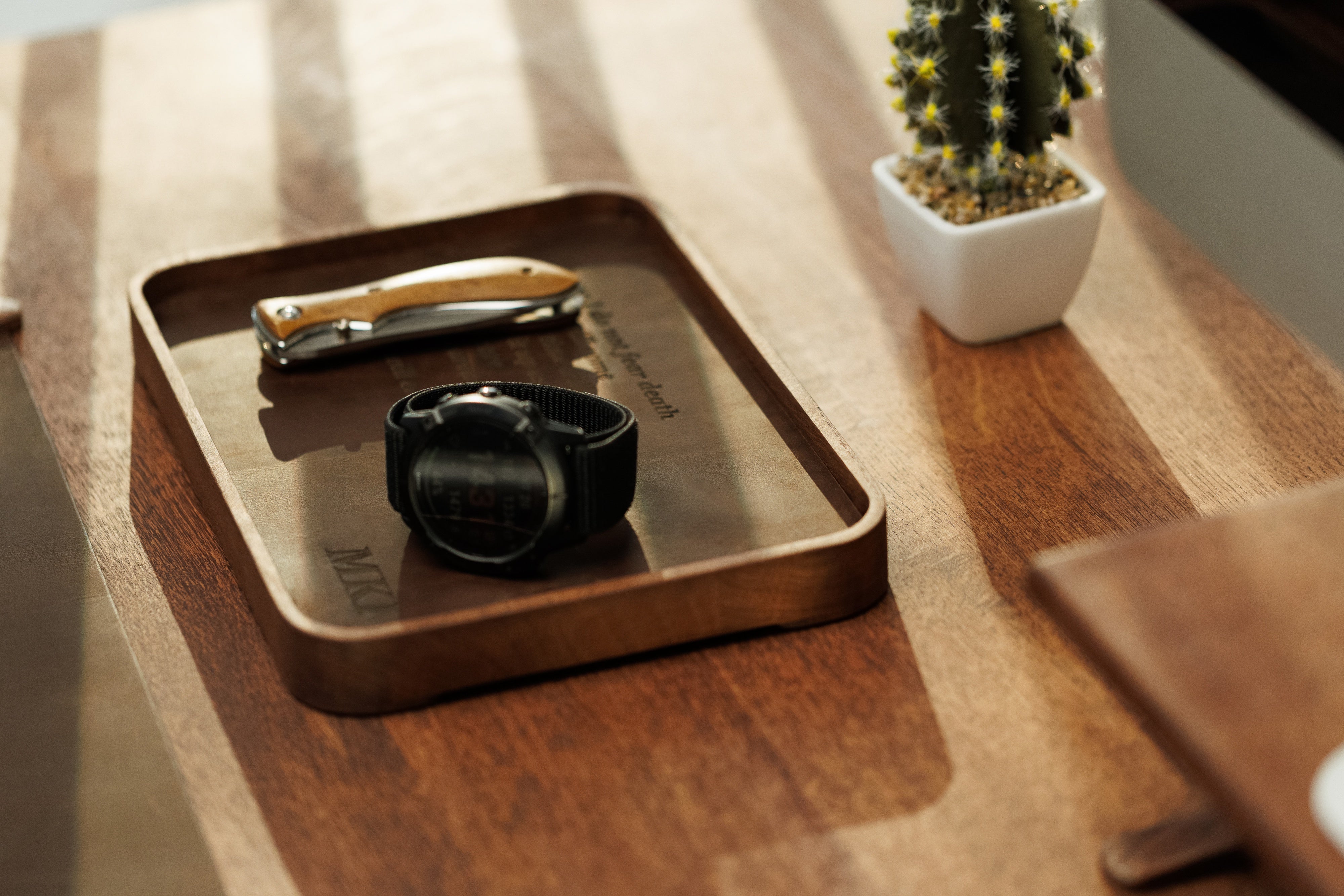 MureliWoodCraft tray catching morning sunlight on desk