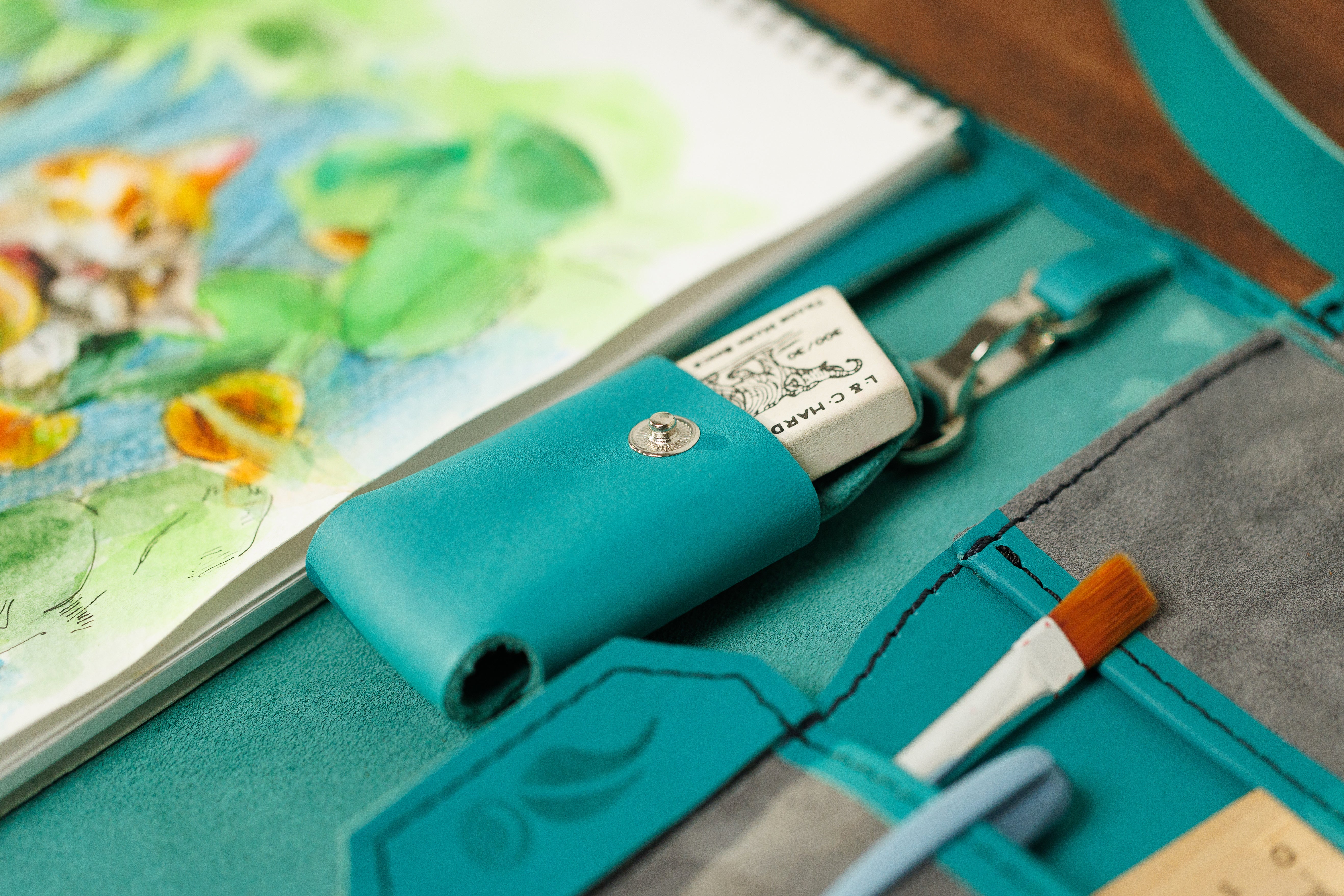 Vibrant energy teal leather sketchbook holder