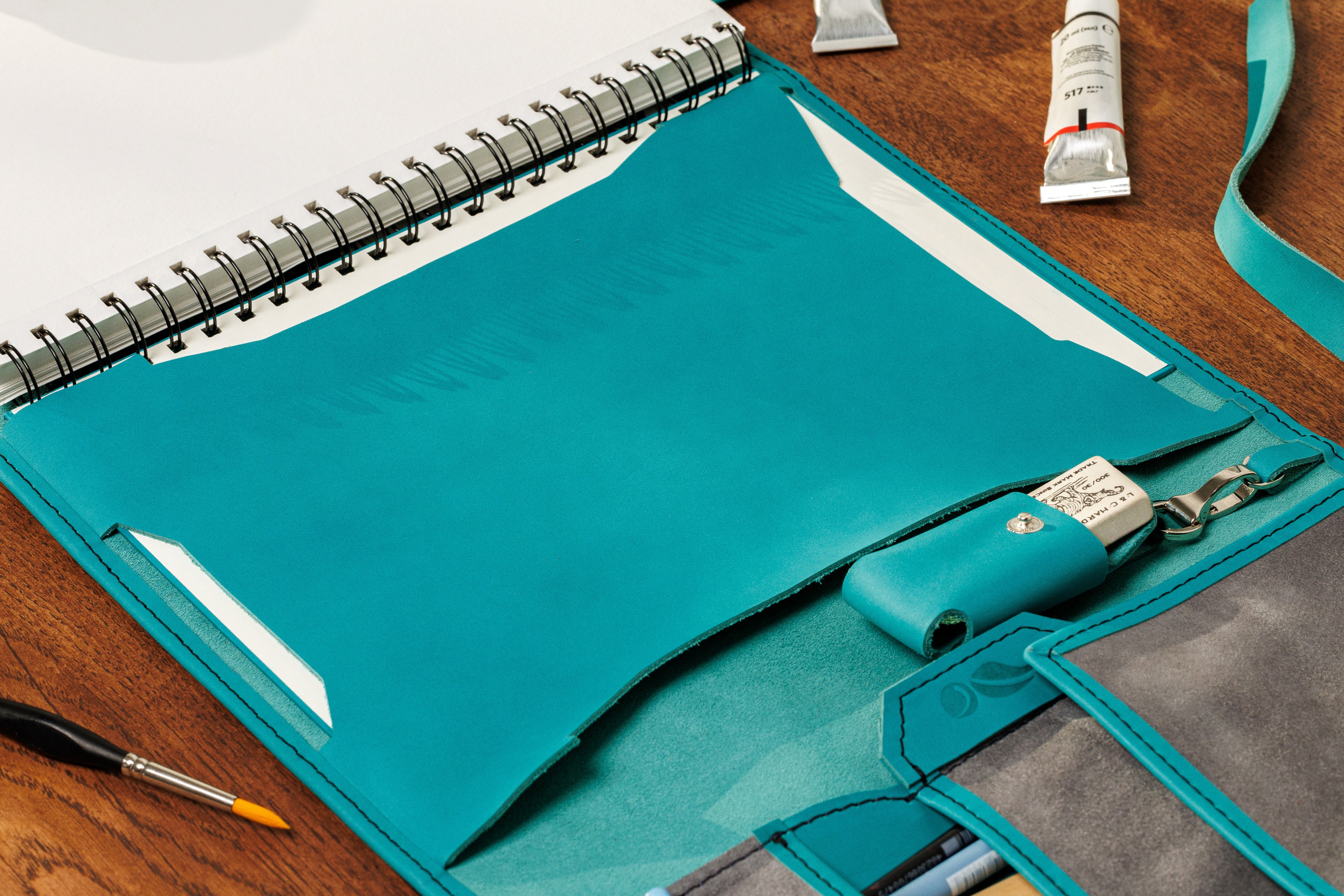 Vibrant teal leather sketch organizer | Mureli Workshop