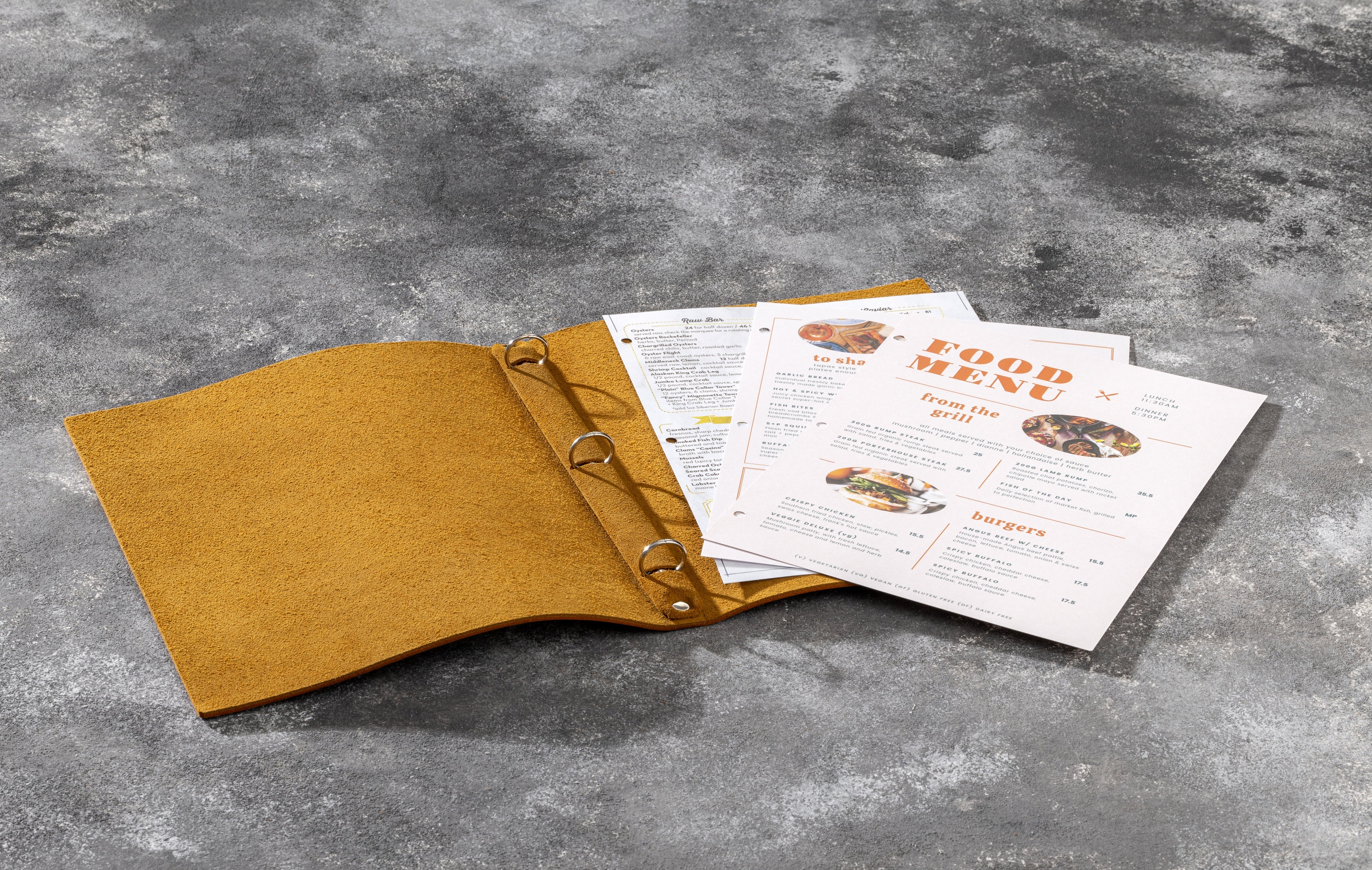 Handmade caramel-colored leather menu holder for restaurants and cafes