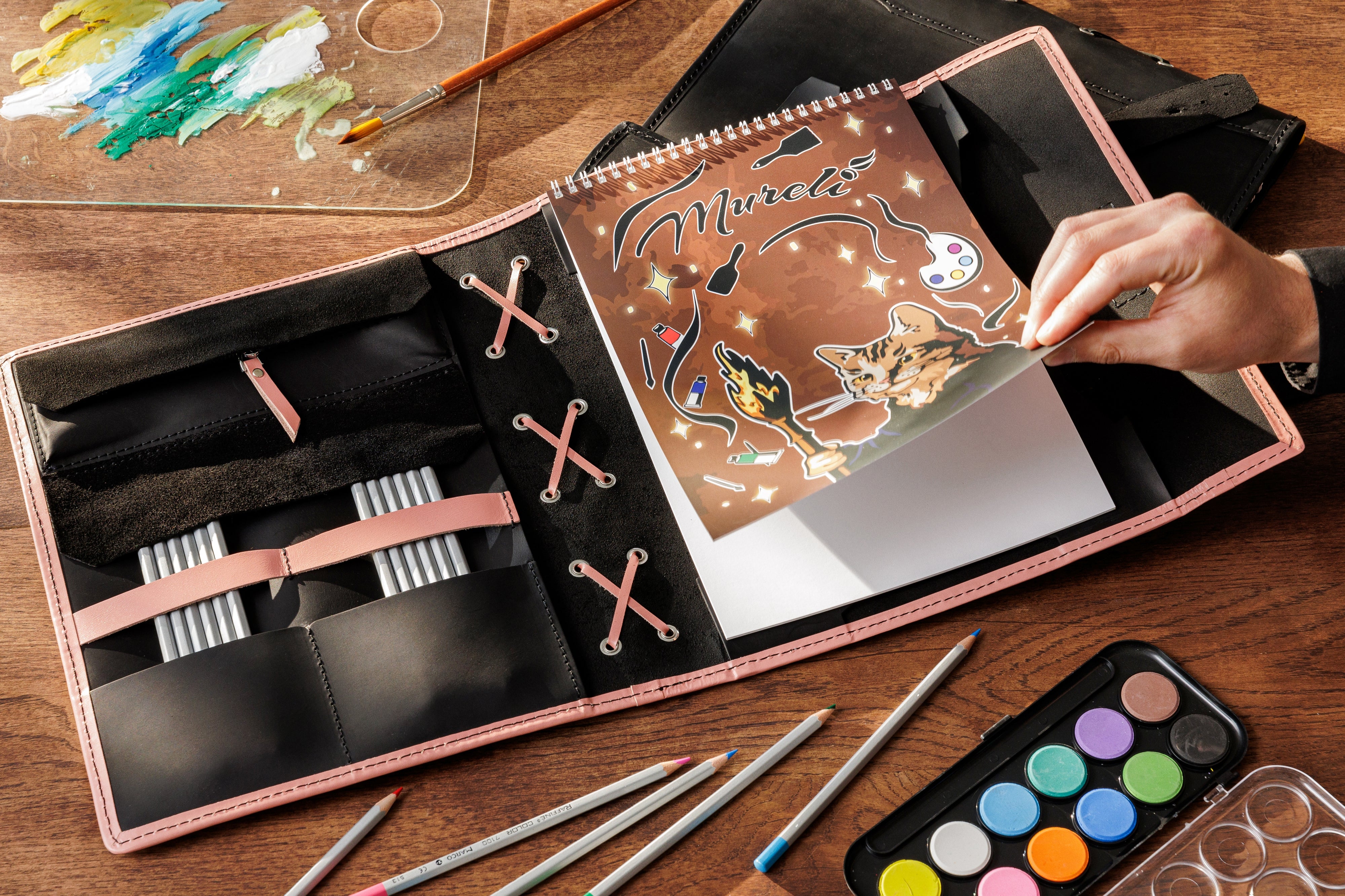 Elegant black and pink Crazy Horse leather sketchbook — refillable and custom made by Mureli