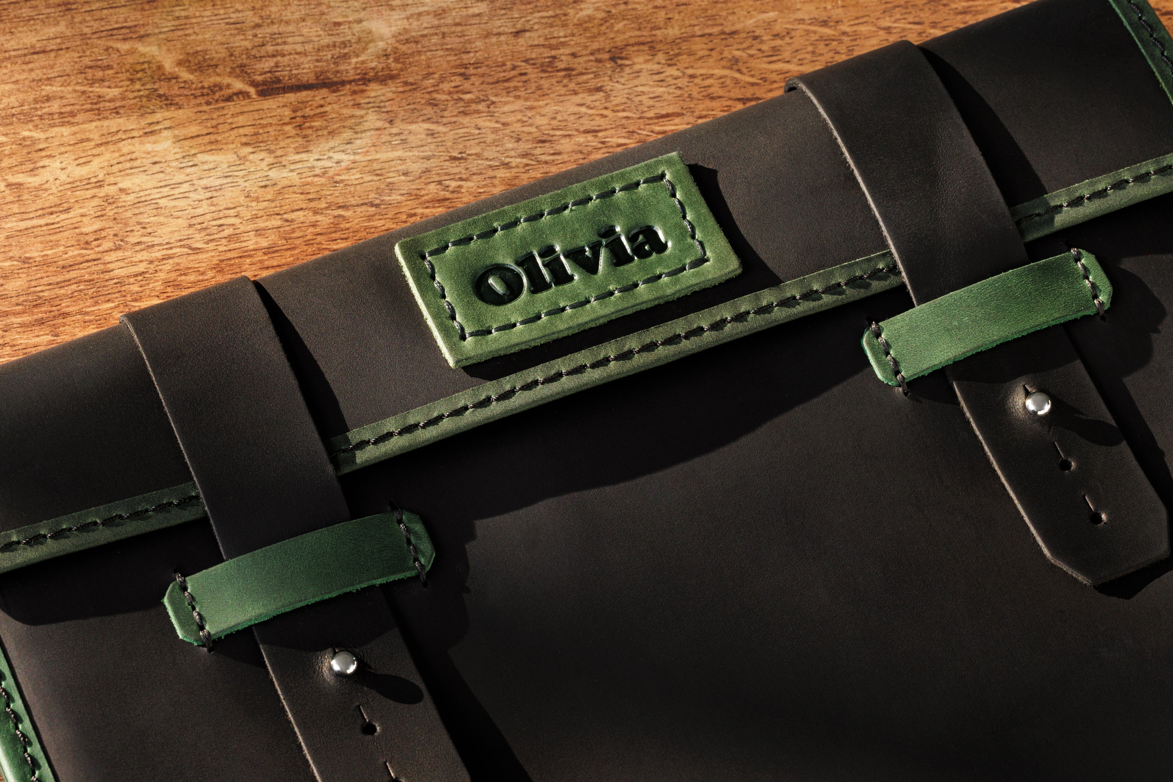 Close-up of name patch "Olivia" embossed on green leather strap – La Vita Collection
