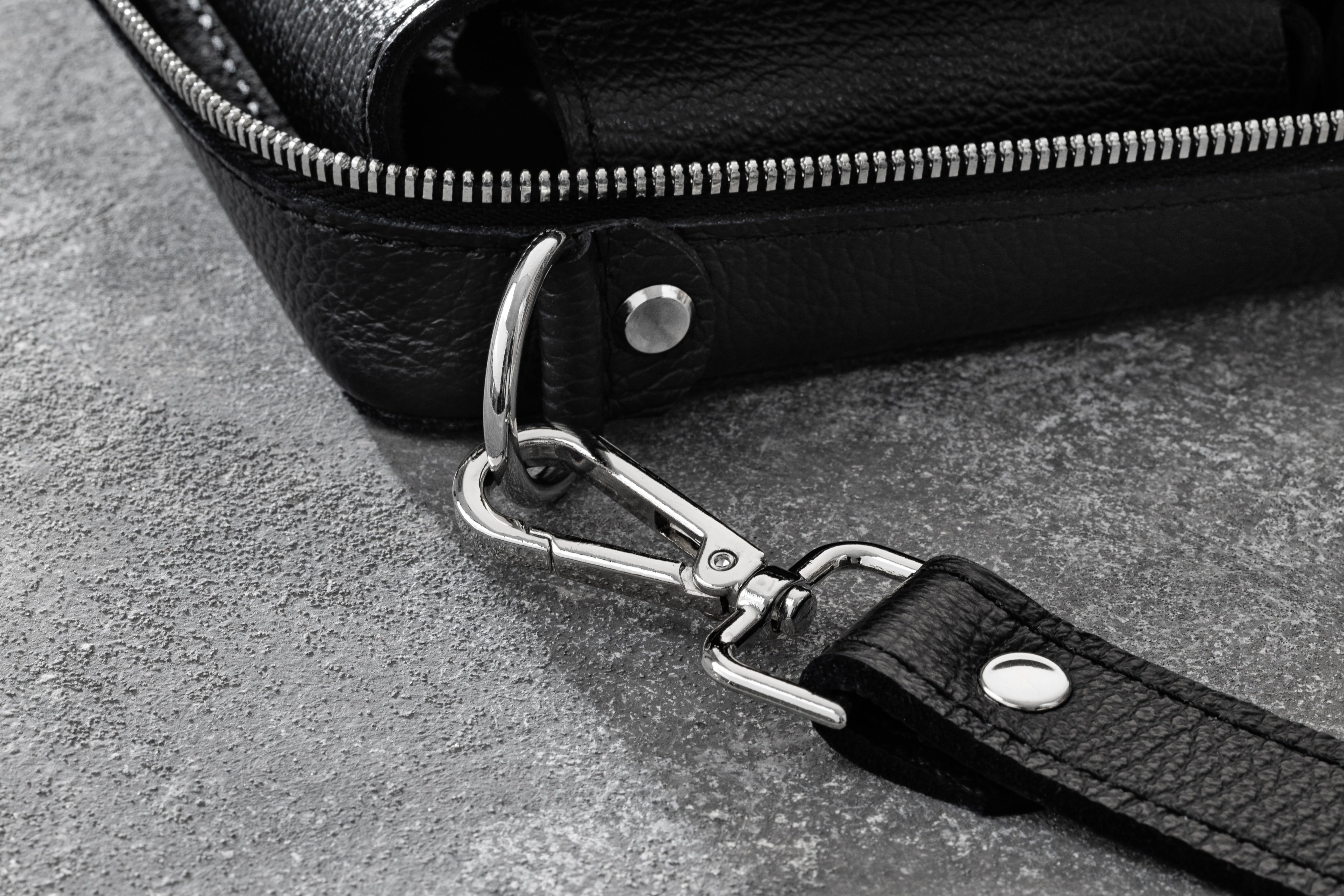 Adjustable Strap and Metal Hardware Detail on Leather Artist Bag