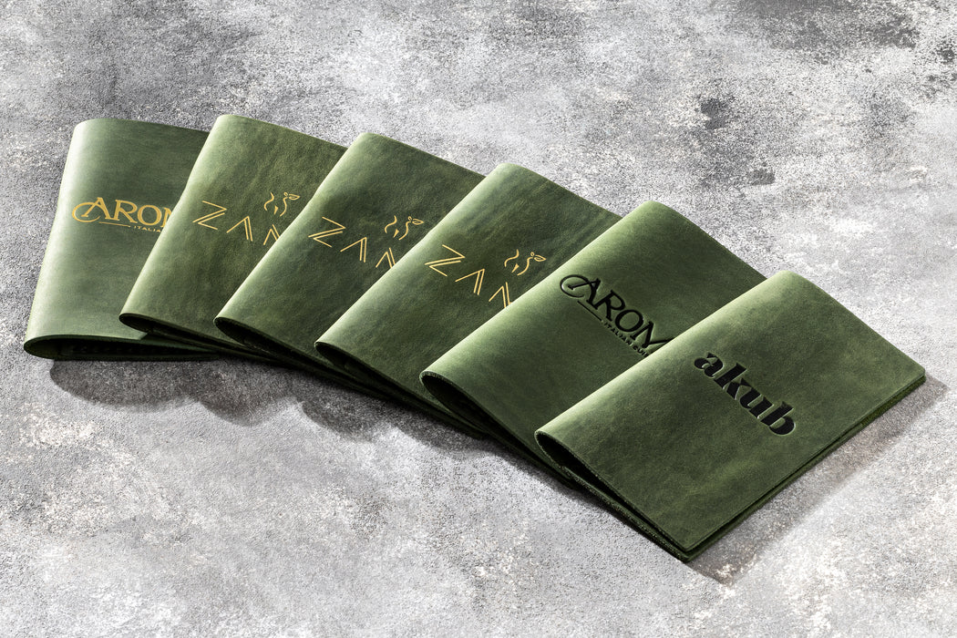 Green leather bill holder with your restaurant logo with gold leaf