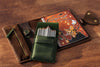Leather organizer with butterfly clasp – inside view with sketchbook and notes