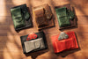 Collection of leather notebook organizers in various colors by Mureli