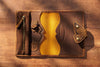 Brown leather sketchbook cover with butterfly closure opened by Mureli