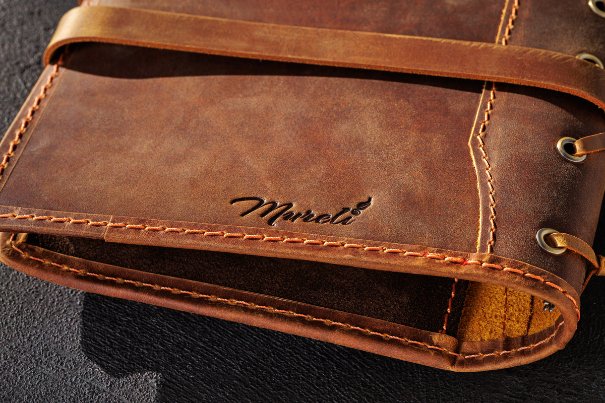 Close-up of Chestnut Crazy Horse leather journal organizer showing natural texture and stitching