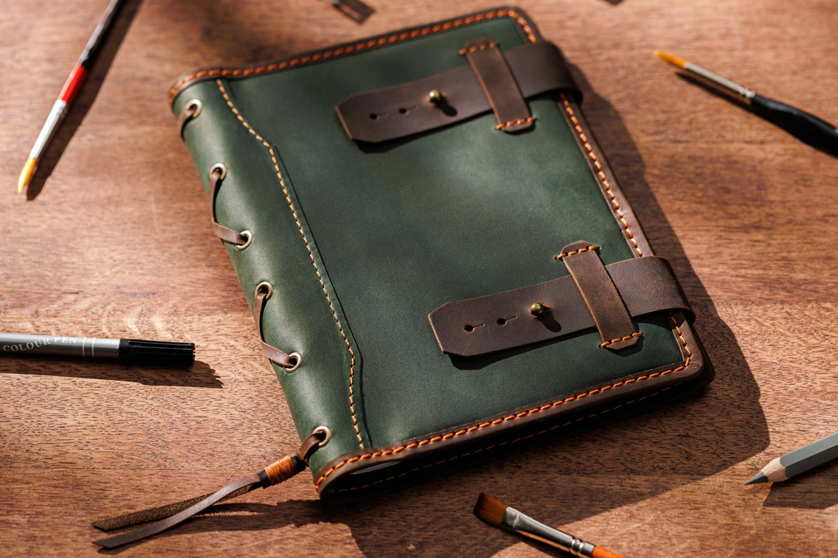 Olive green and brown leather sketchbook organizer for A5 and 8.5 x 5.5 notebook with double strap closure