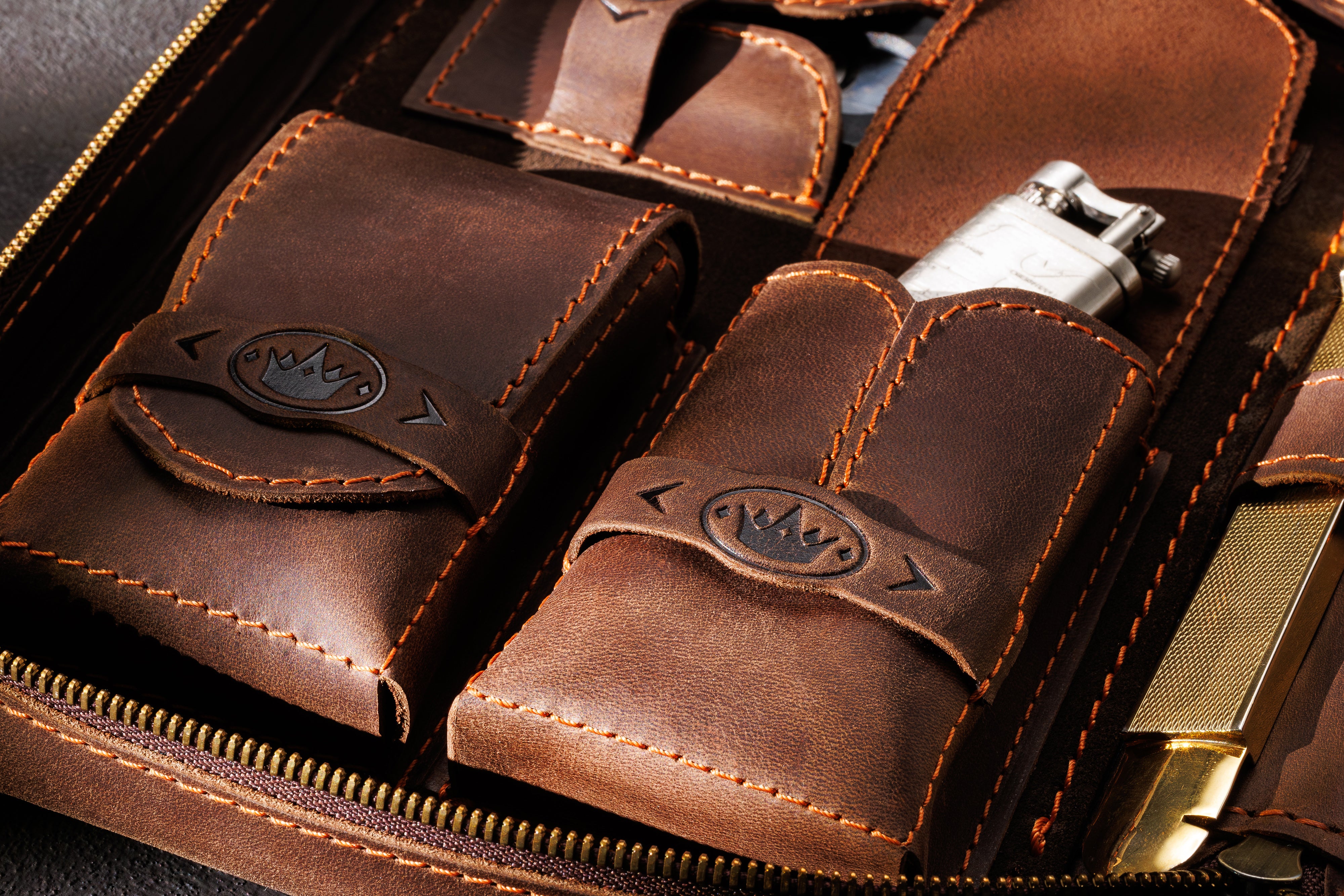 leather pockets of cigar case with crown