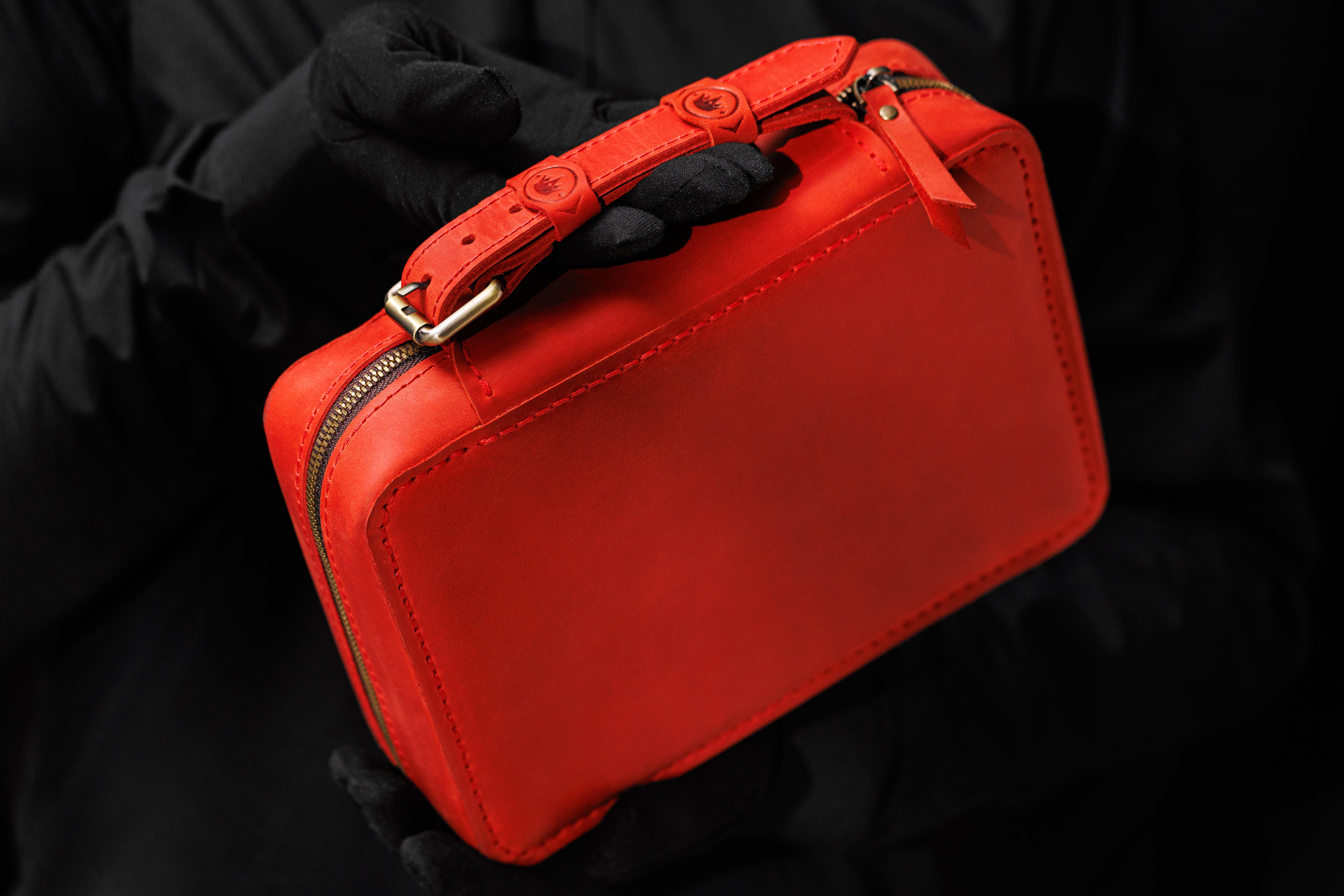 Red Leather Travel Cigar Case in Men's Hands