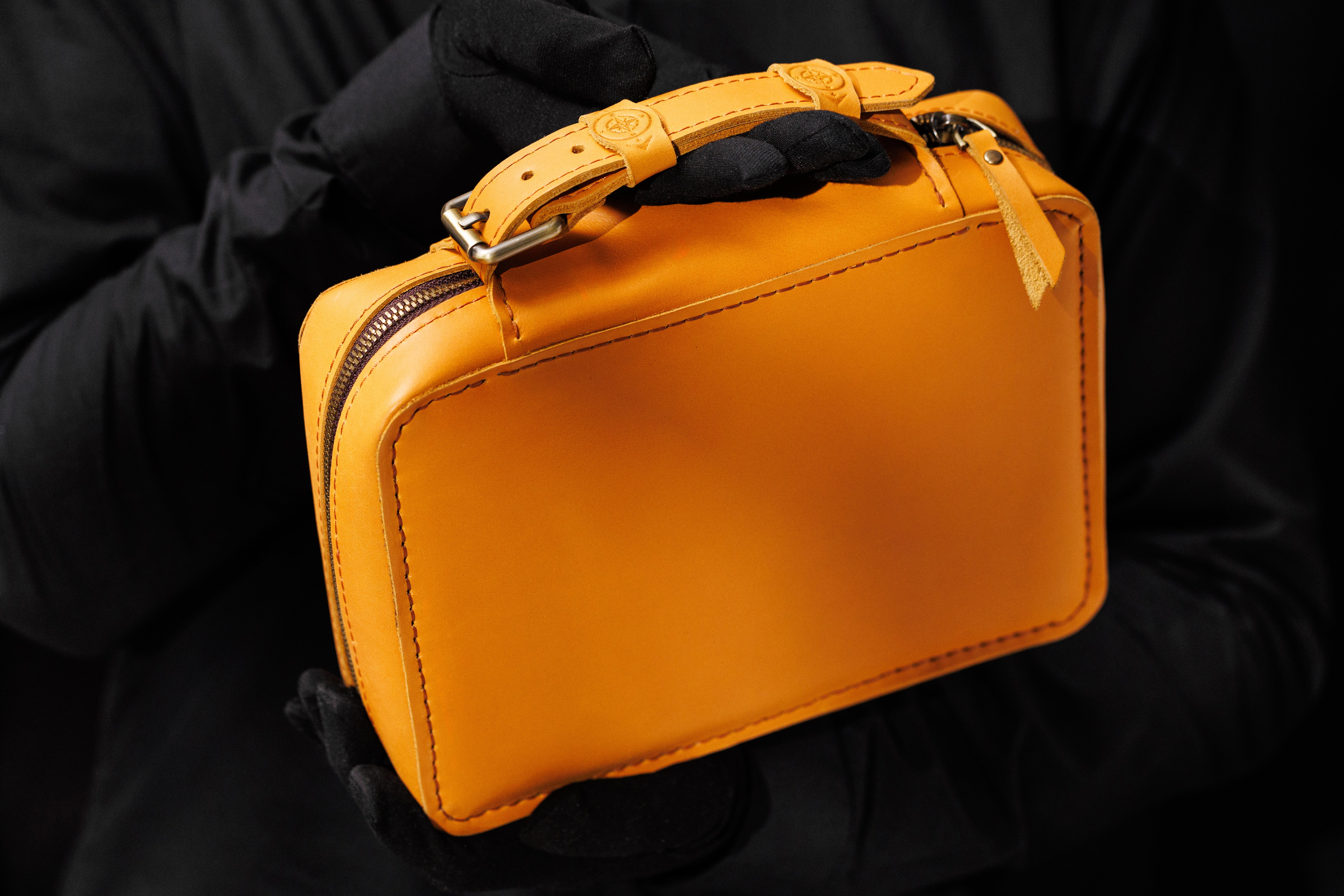 Yellow Leather Travel Cigar Case in Men's Hands