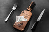 Wooden bottle bill presenter for upscale restaurant
