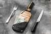 Leather restaurant check holder with brass rivets