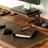 Close-up of premium brown leather texture and edge stitching on Mureli journal