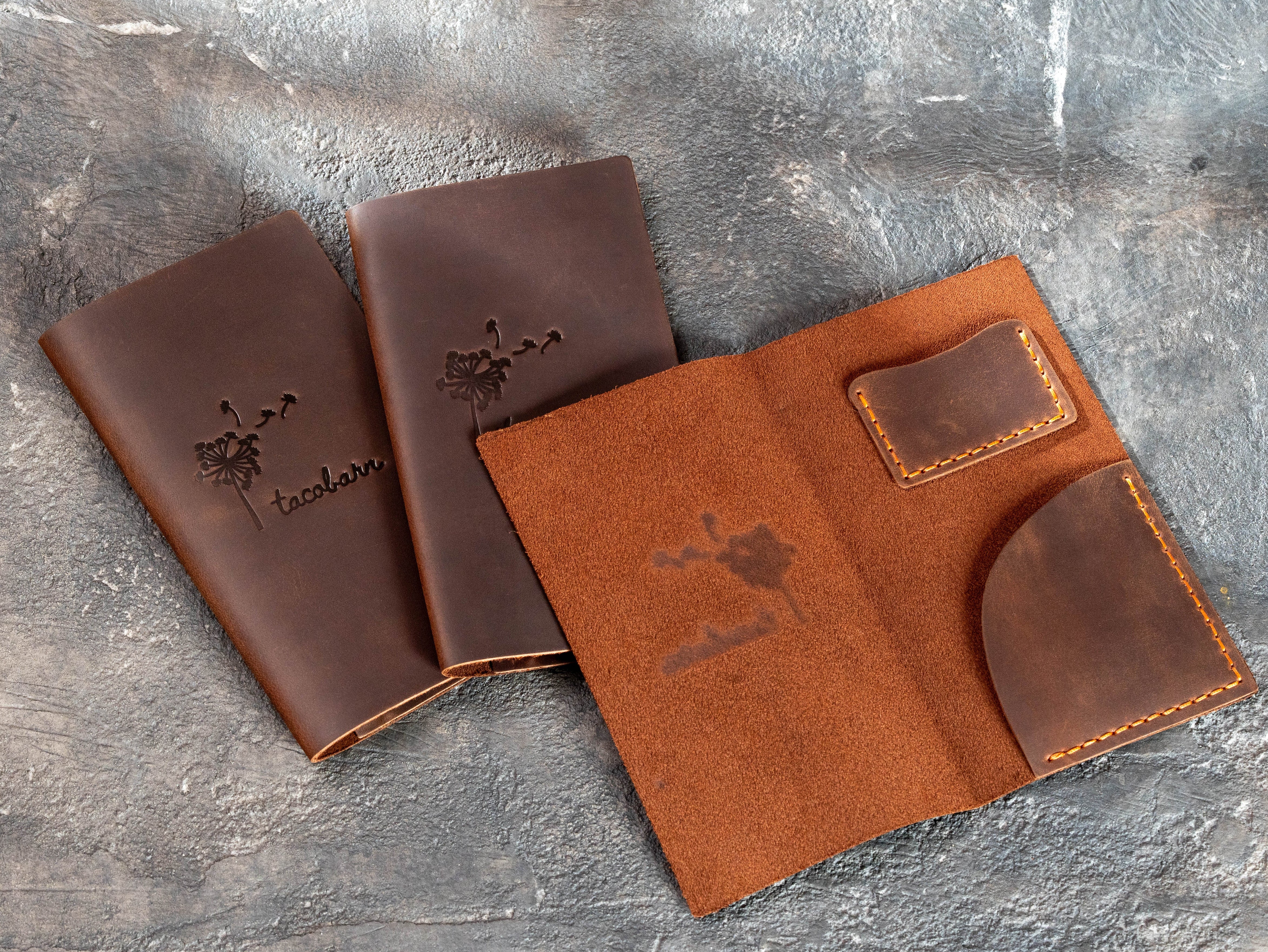 Brown leather Taco Bar check presenters with an open Design No. 2 interior featuring receipt and card pockets