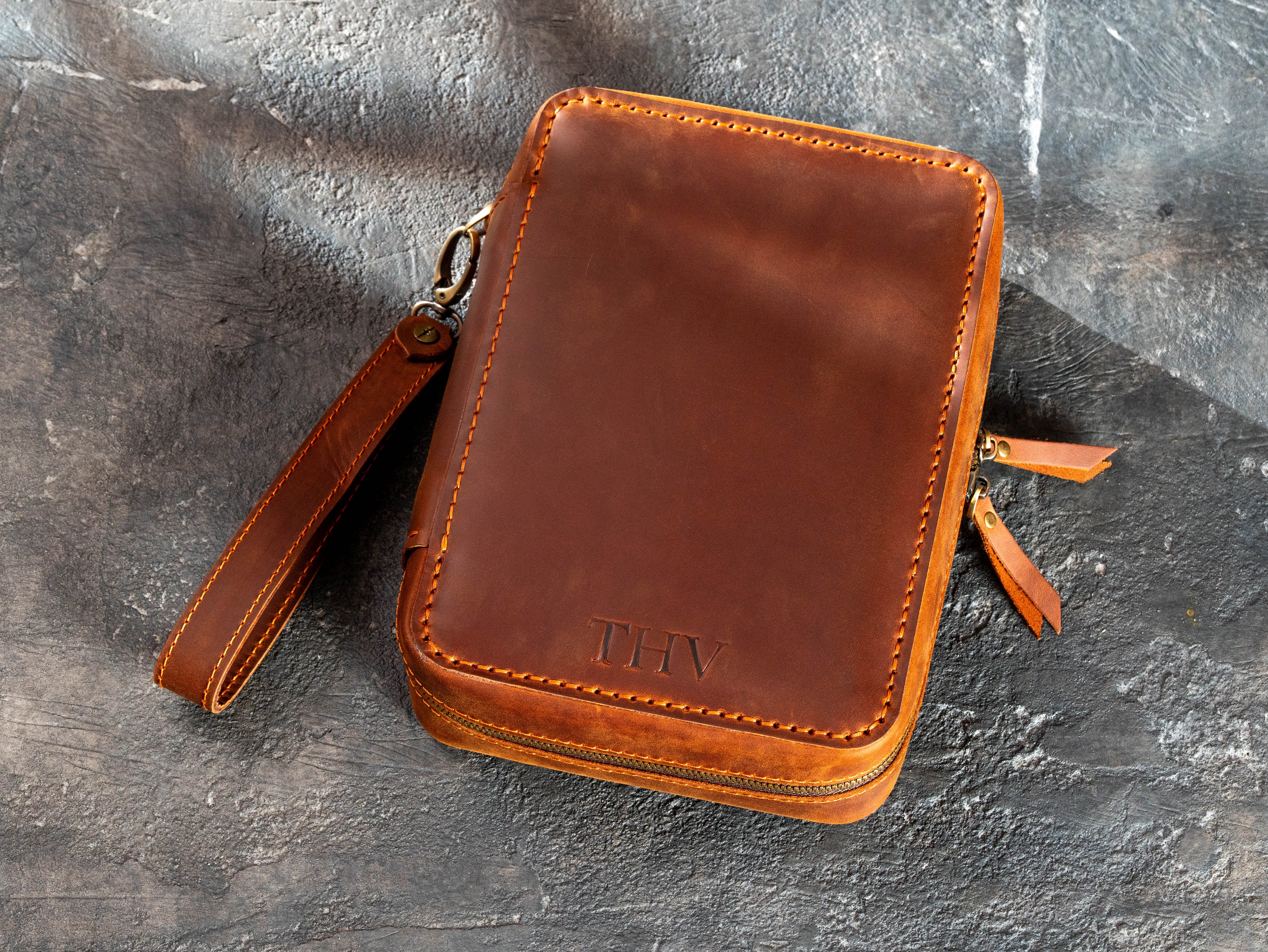Copper Crazy Horse leather travel cigar case with THV initials, reinforced wrist strap, and dual zipper pulls