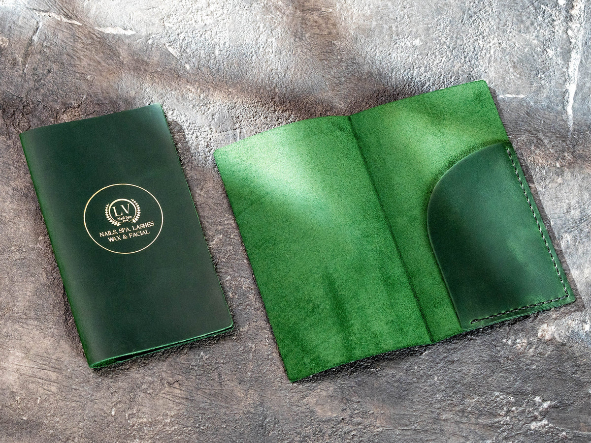 Green leather check presenter shown closed and open with curved interior pocket