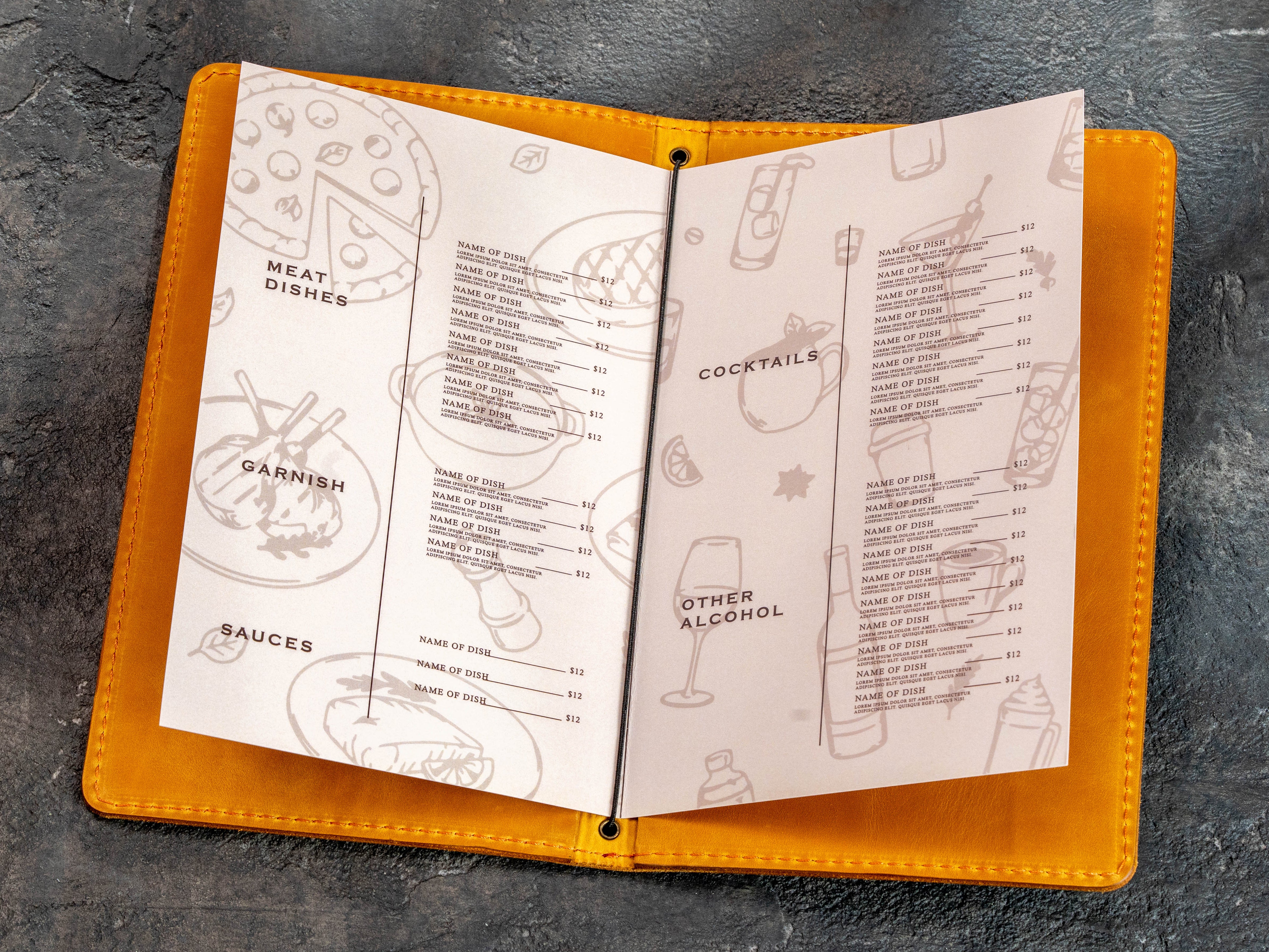 Open golden yellow leather restaurant menu cover with printed food menu pages secured by an elastic cord