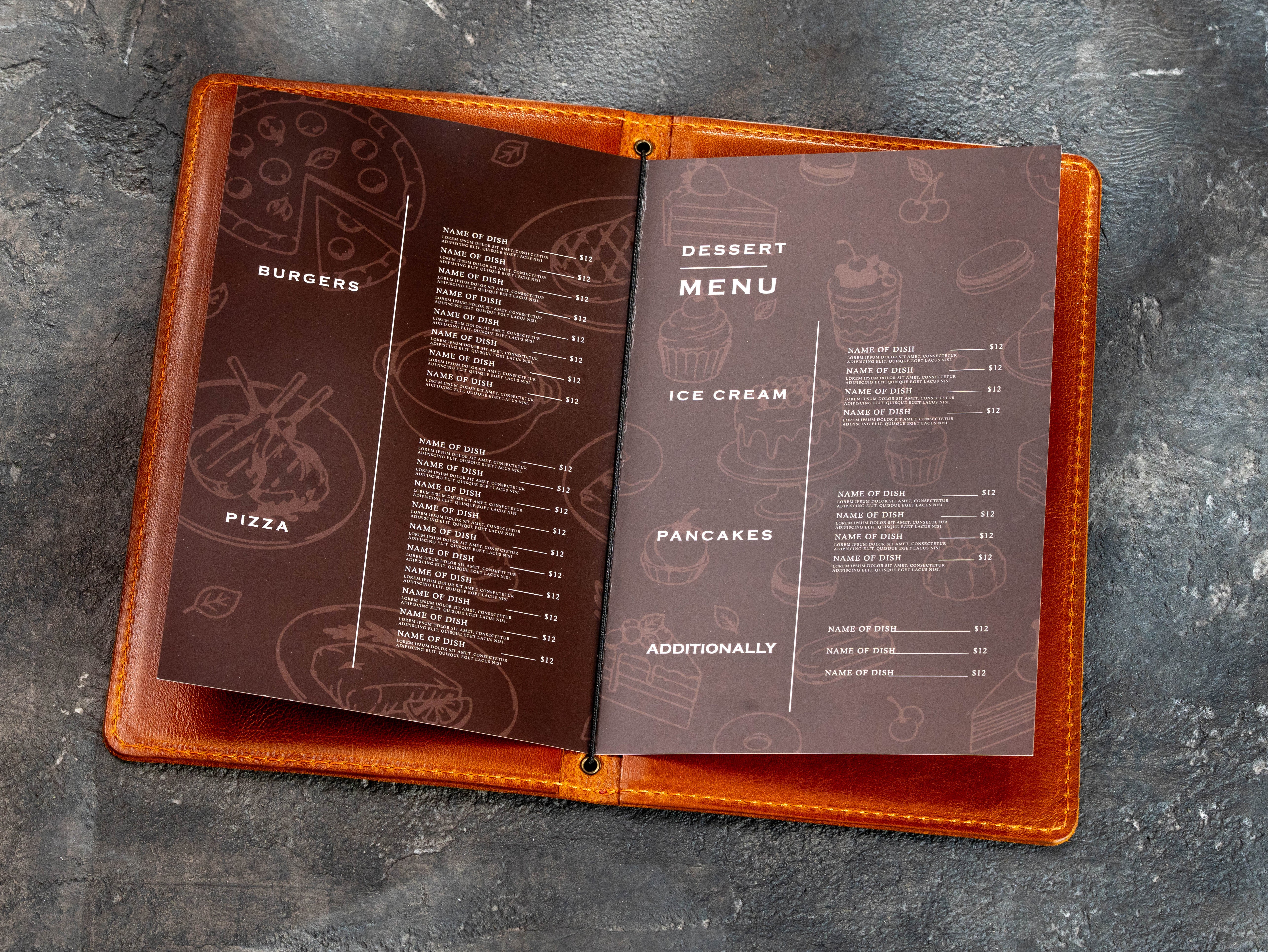 Open camel leather restaurant menu cover with printed food menu pages secured by a central elastic cord