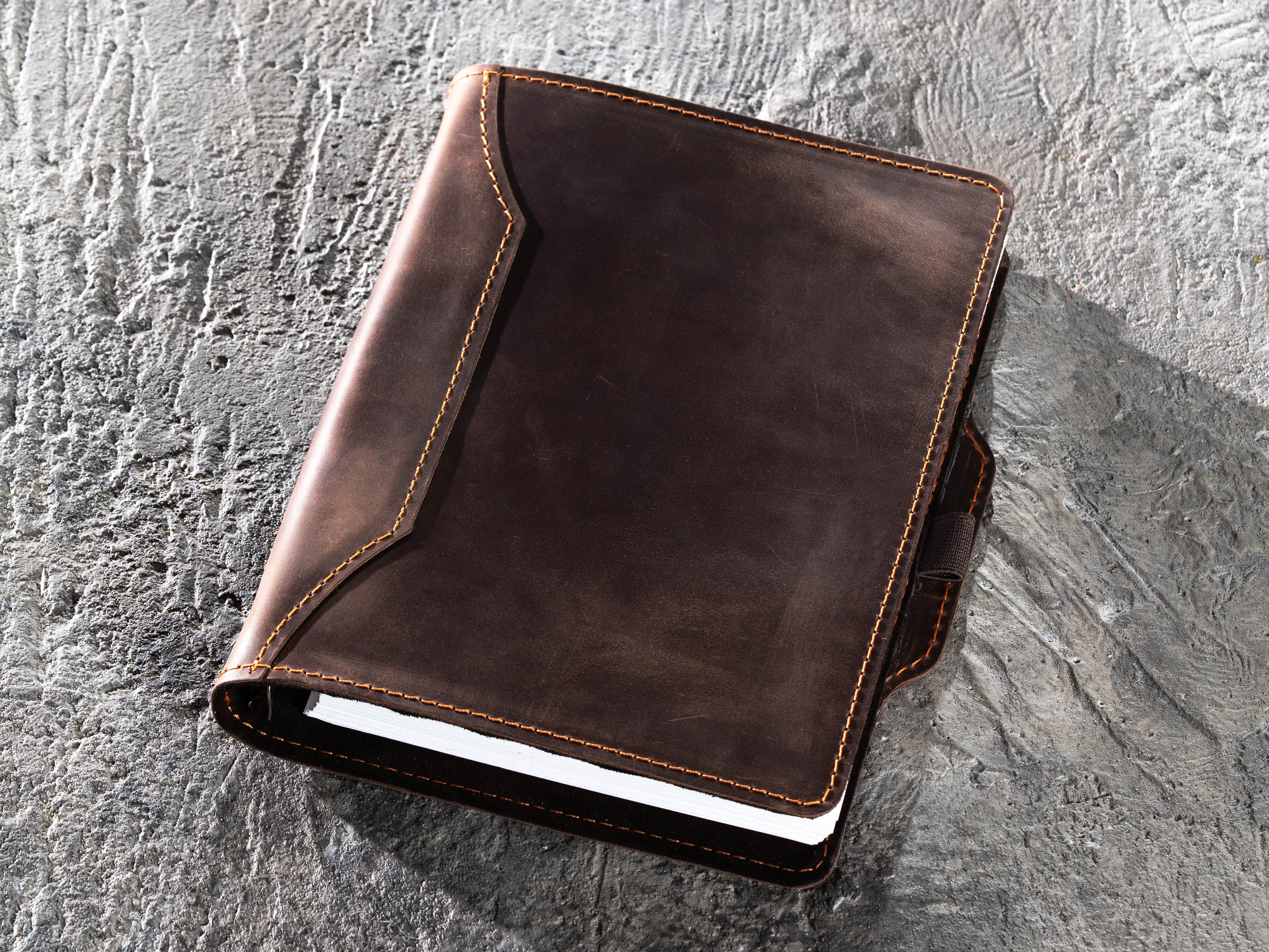 Dark brown leather A5 binder notebook with decorative front cover and side pen holder