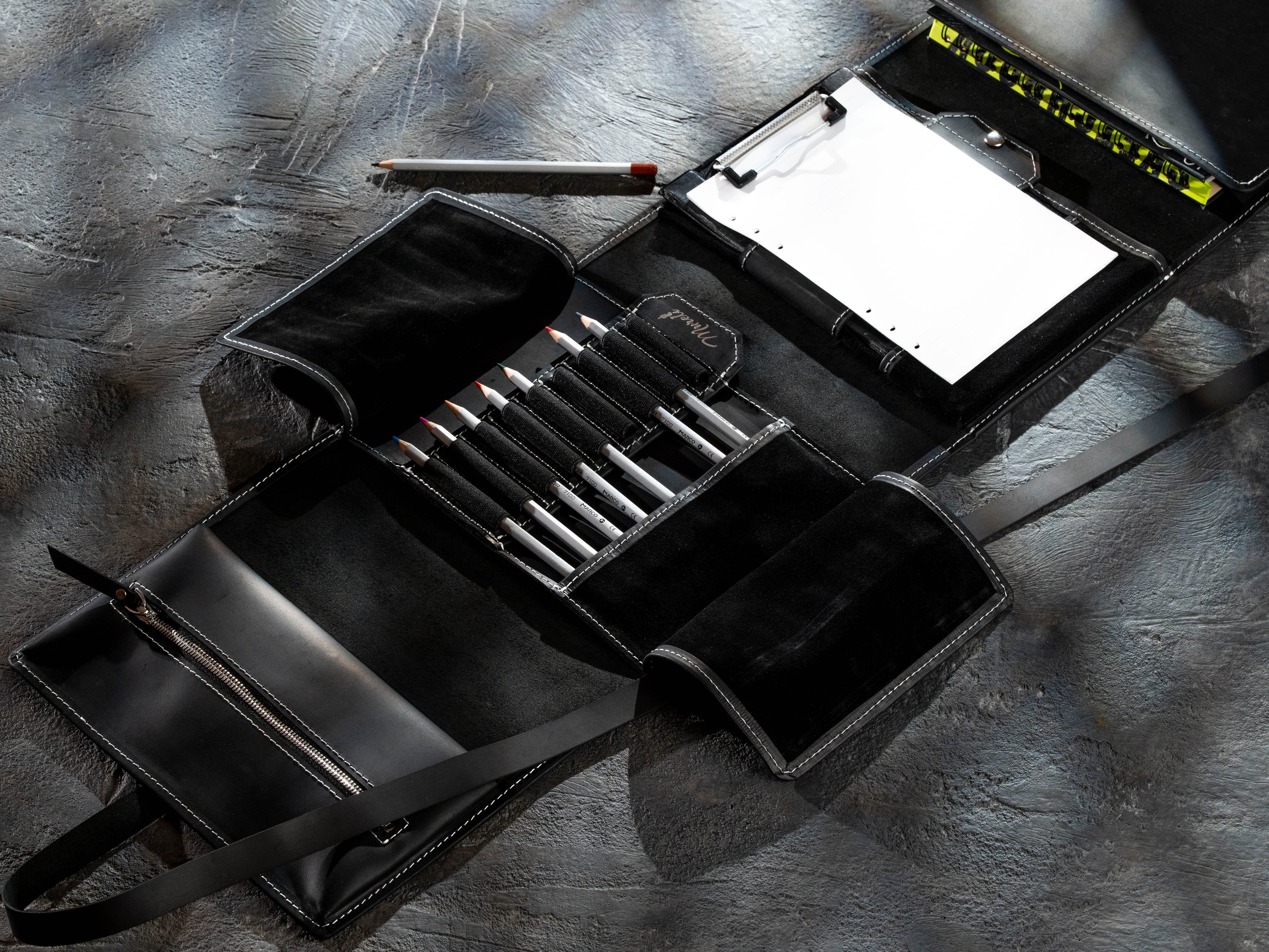 Large black leather artist organizer with pencil holder, clipboard insert and sketchbook storage