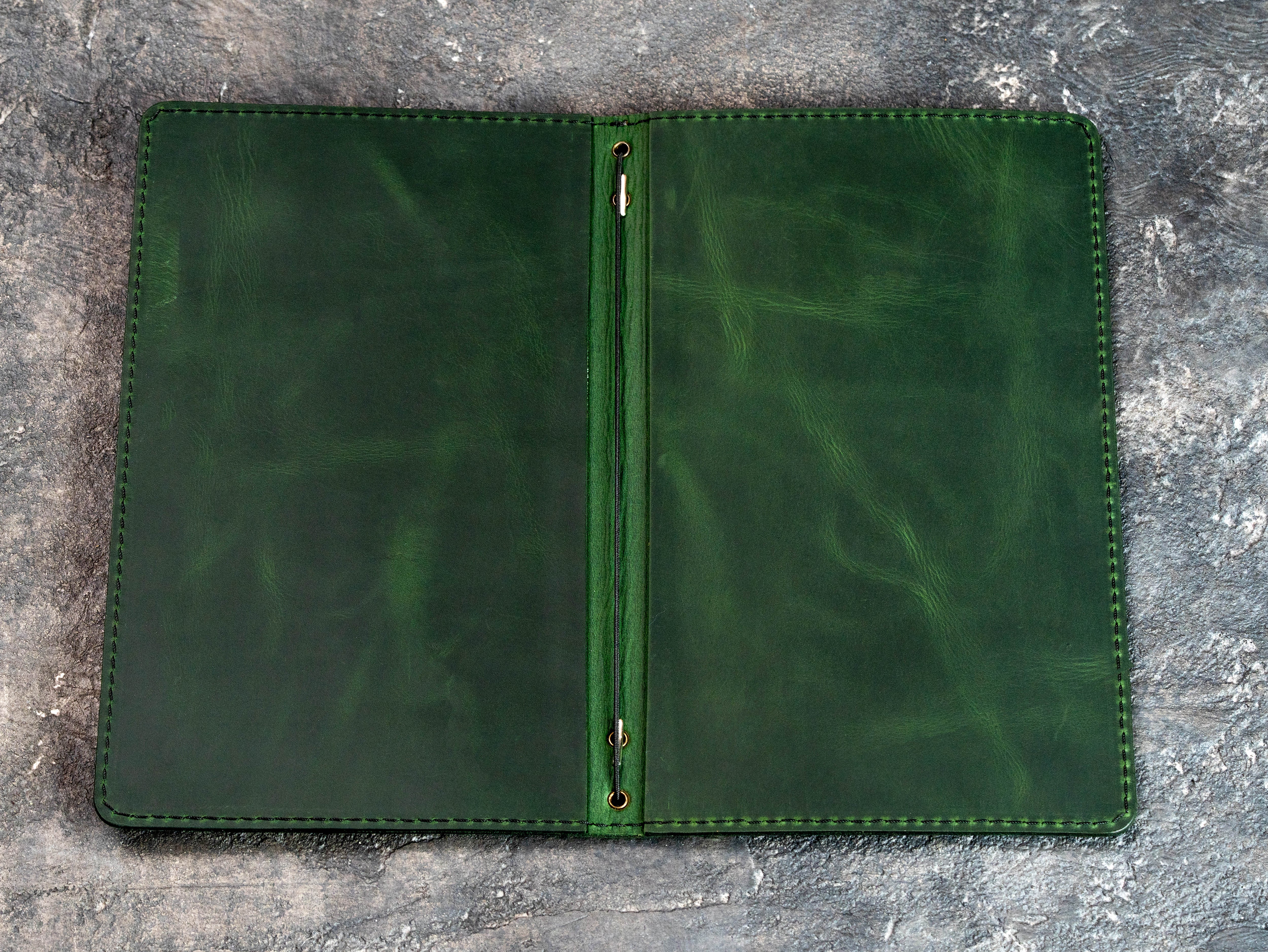 Green genuine leather menu cover displayed with other available leather color options