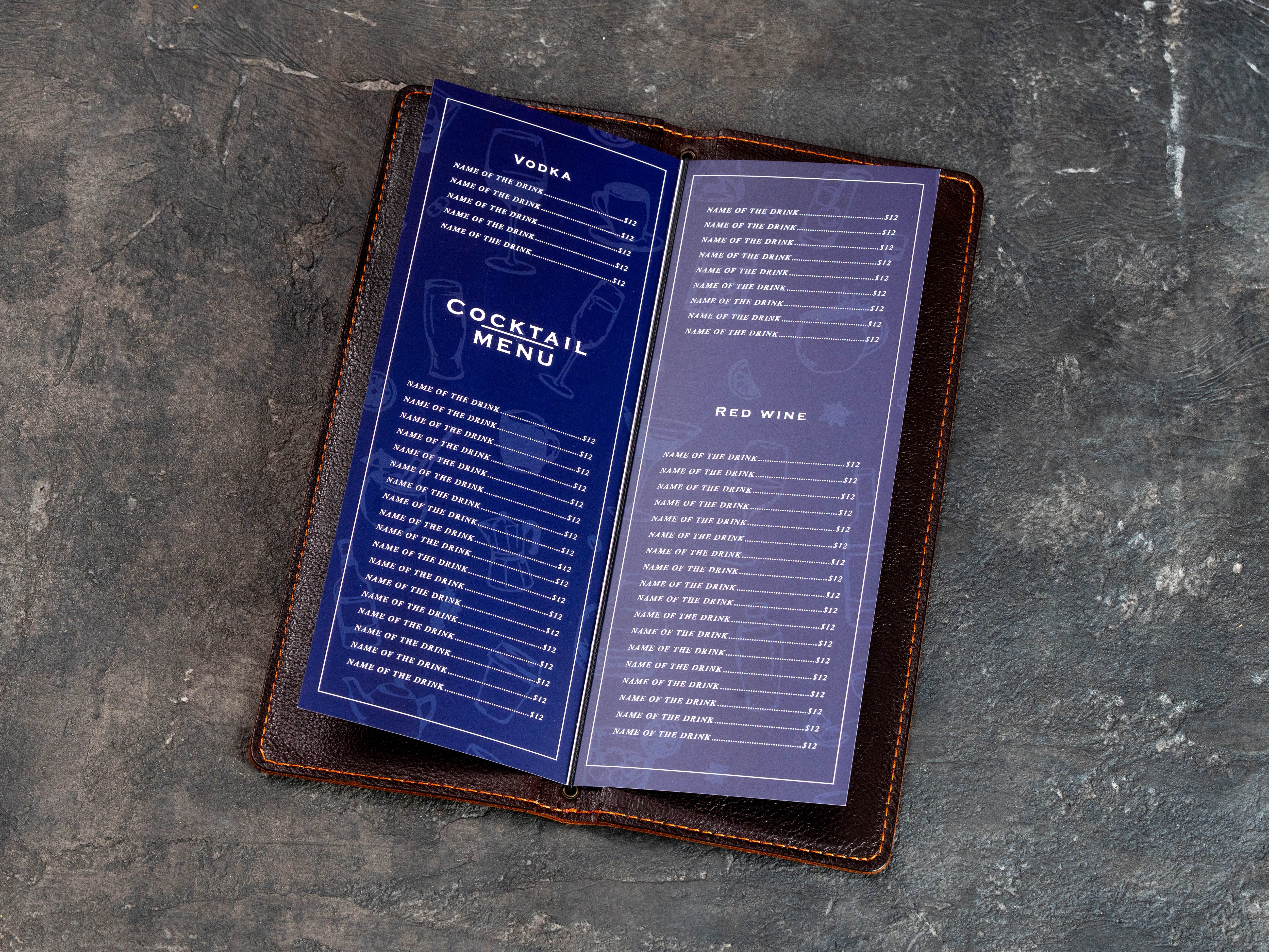 Dark brown leather cocktail and wine menu cover with printed drink menu pages secured by elastic cord