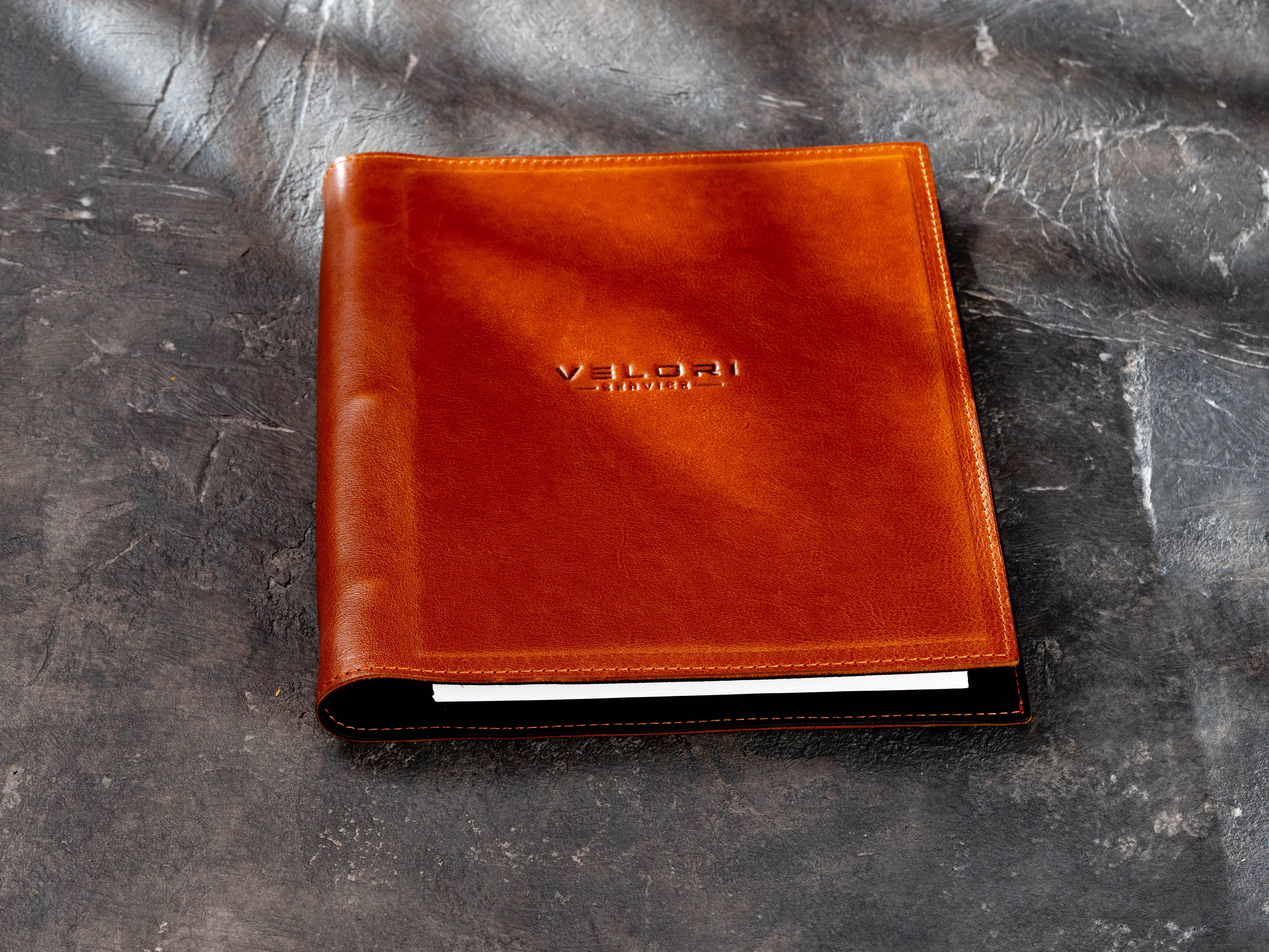 Personalized camel leather 3-ring binder folder with a custom embossed company logo