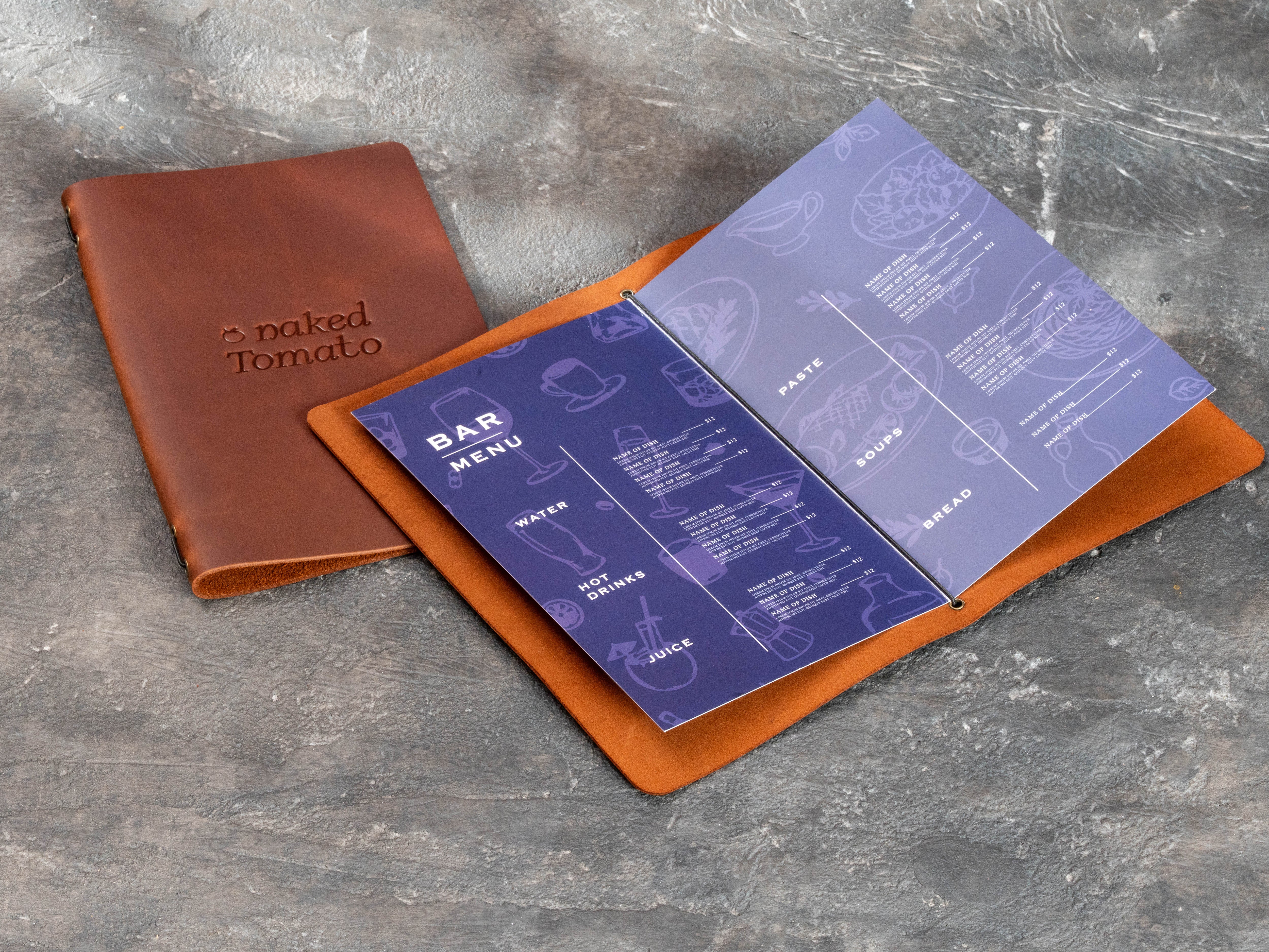 Custom brown leather bar menu book with replaceable printed pages, elastic cord binding and blind embossed restaurant logo.