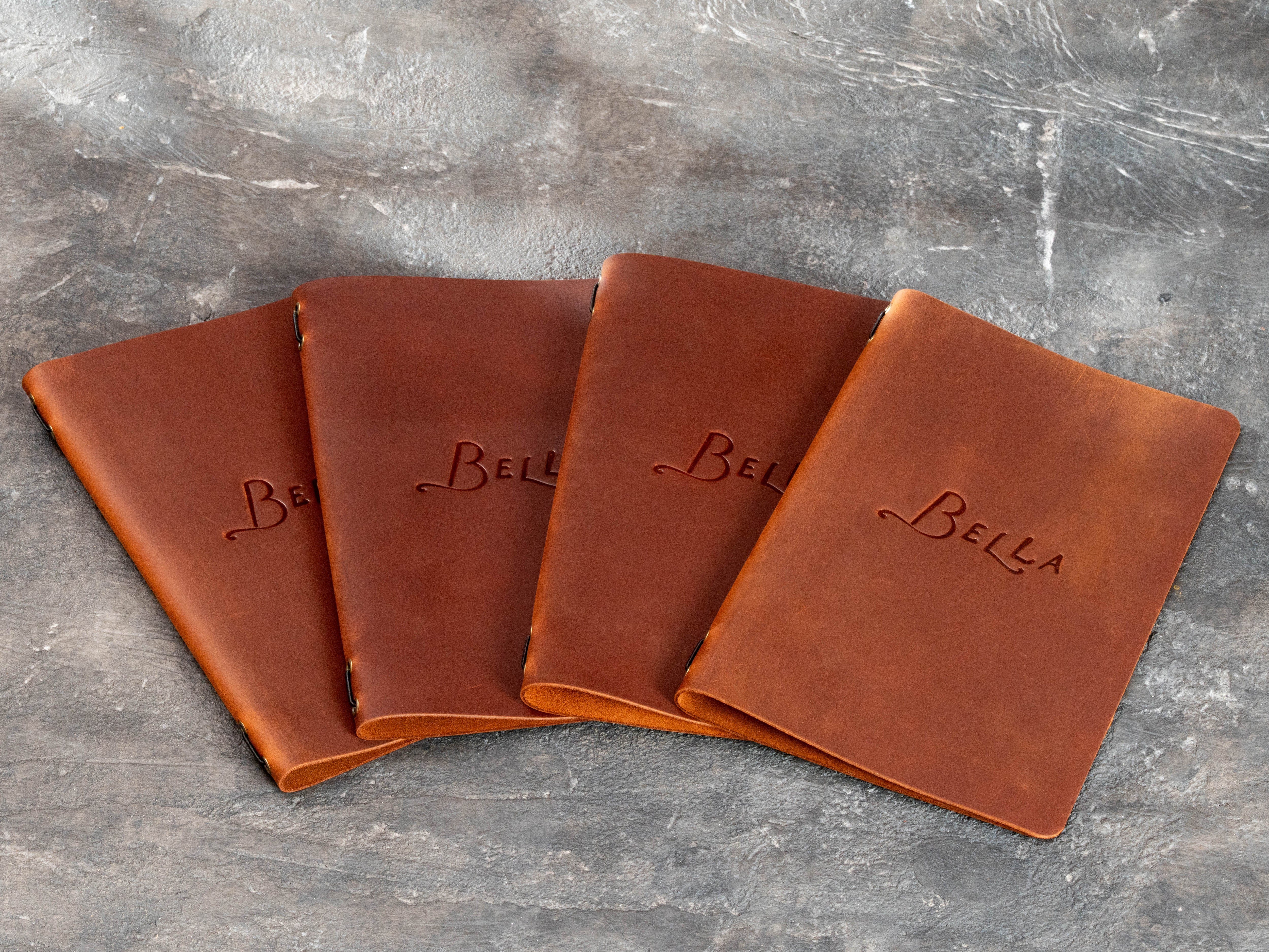 Bella leather menu covers in copper color