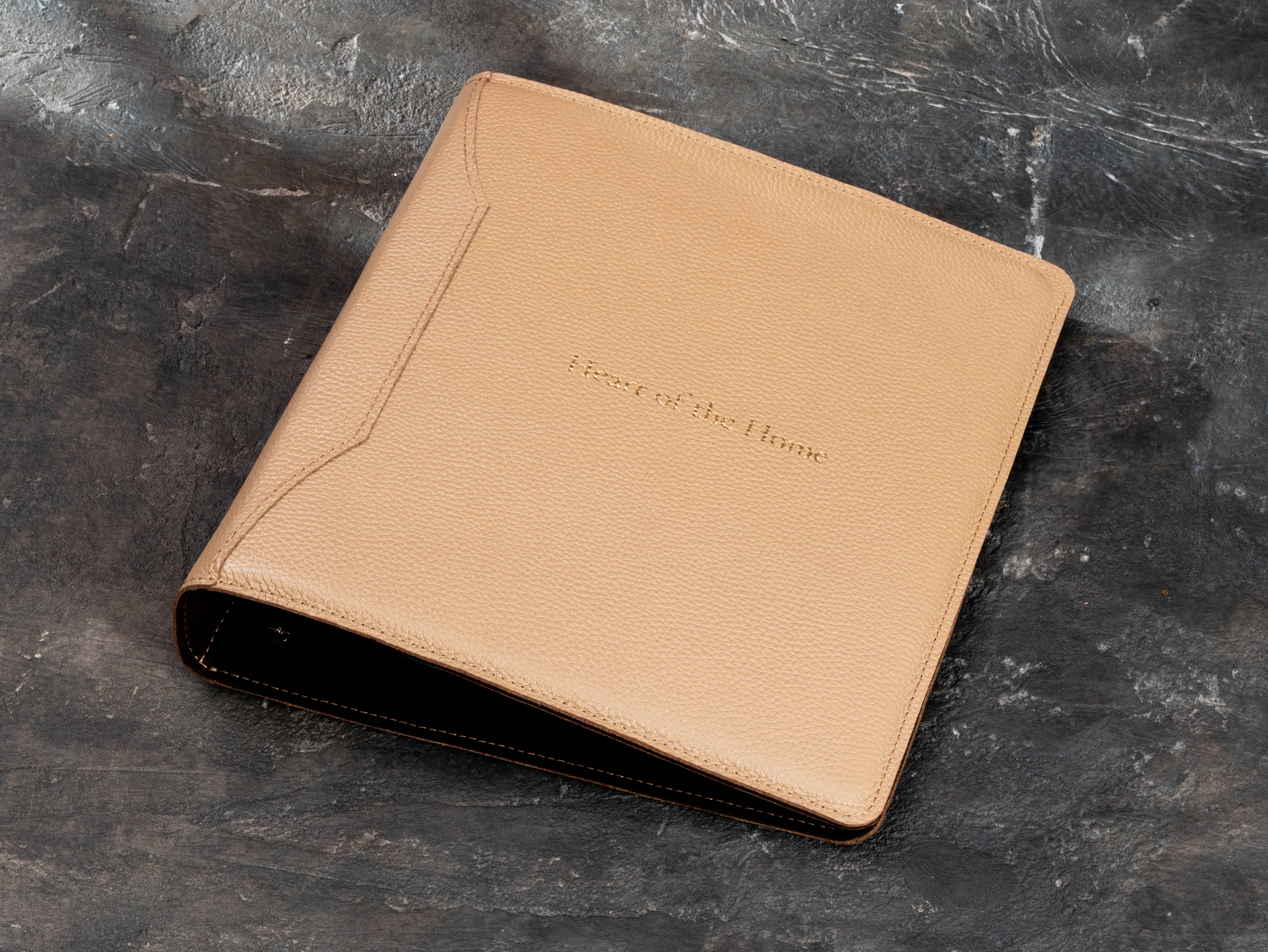 Natural Sand leather home archive binder with gold embossed title on the cover