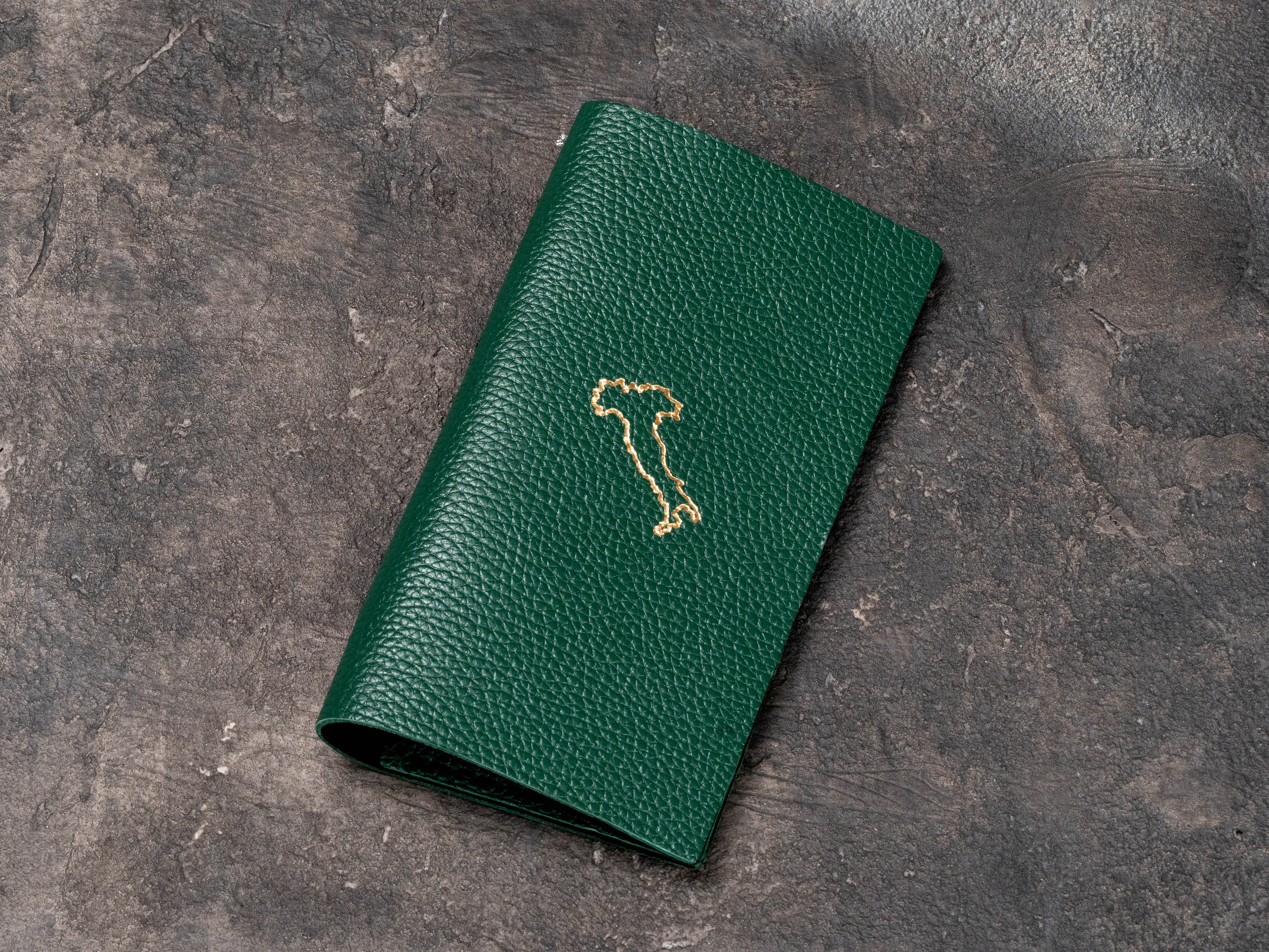 Green floater leather check presenter with thin-line gold foil logo on the front