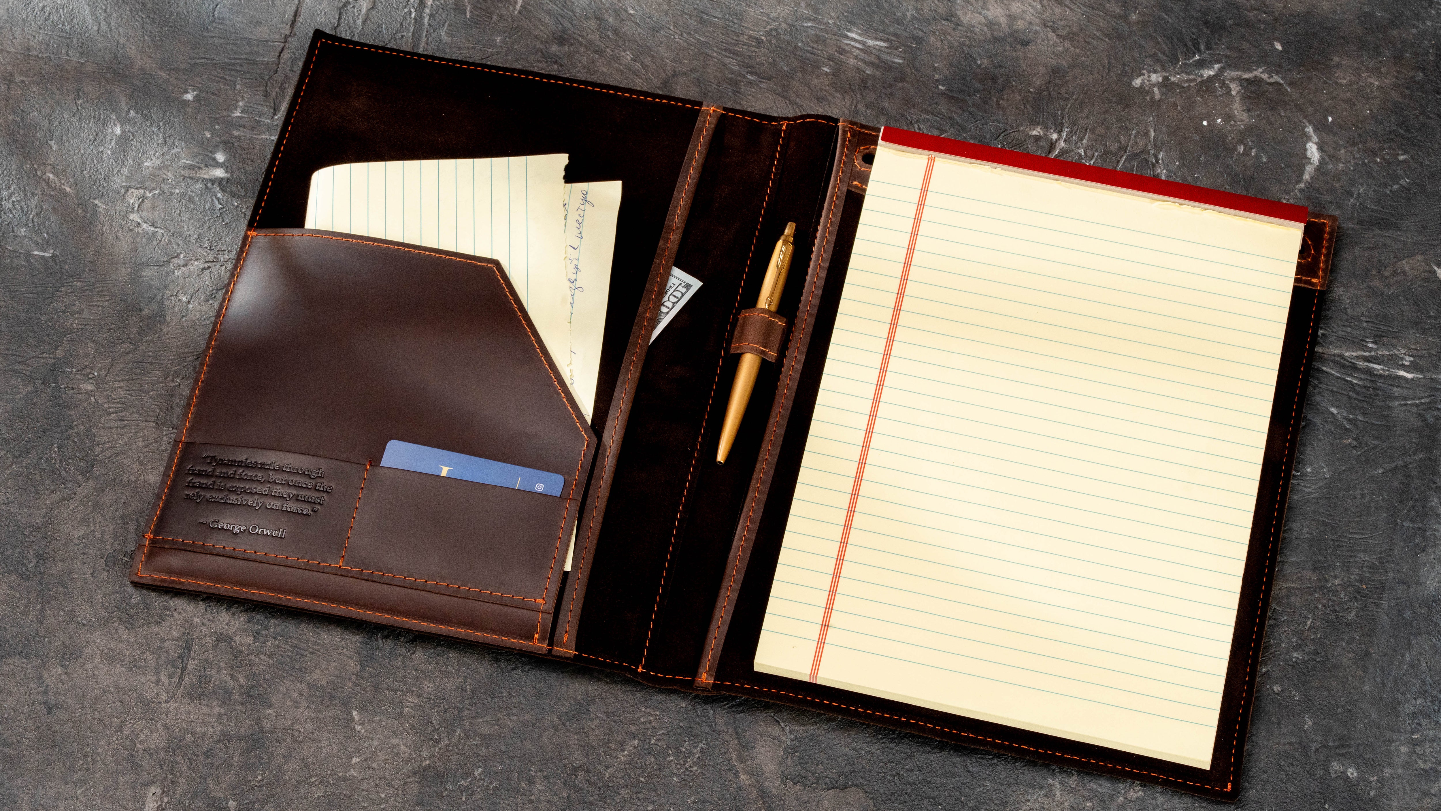 Brown leather business padfolio with 8.5 x 11.75 inch Legal Pad, document pocket, business card slot and pen holder for professional meetings.