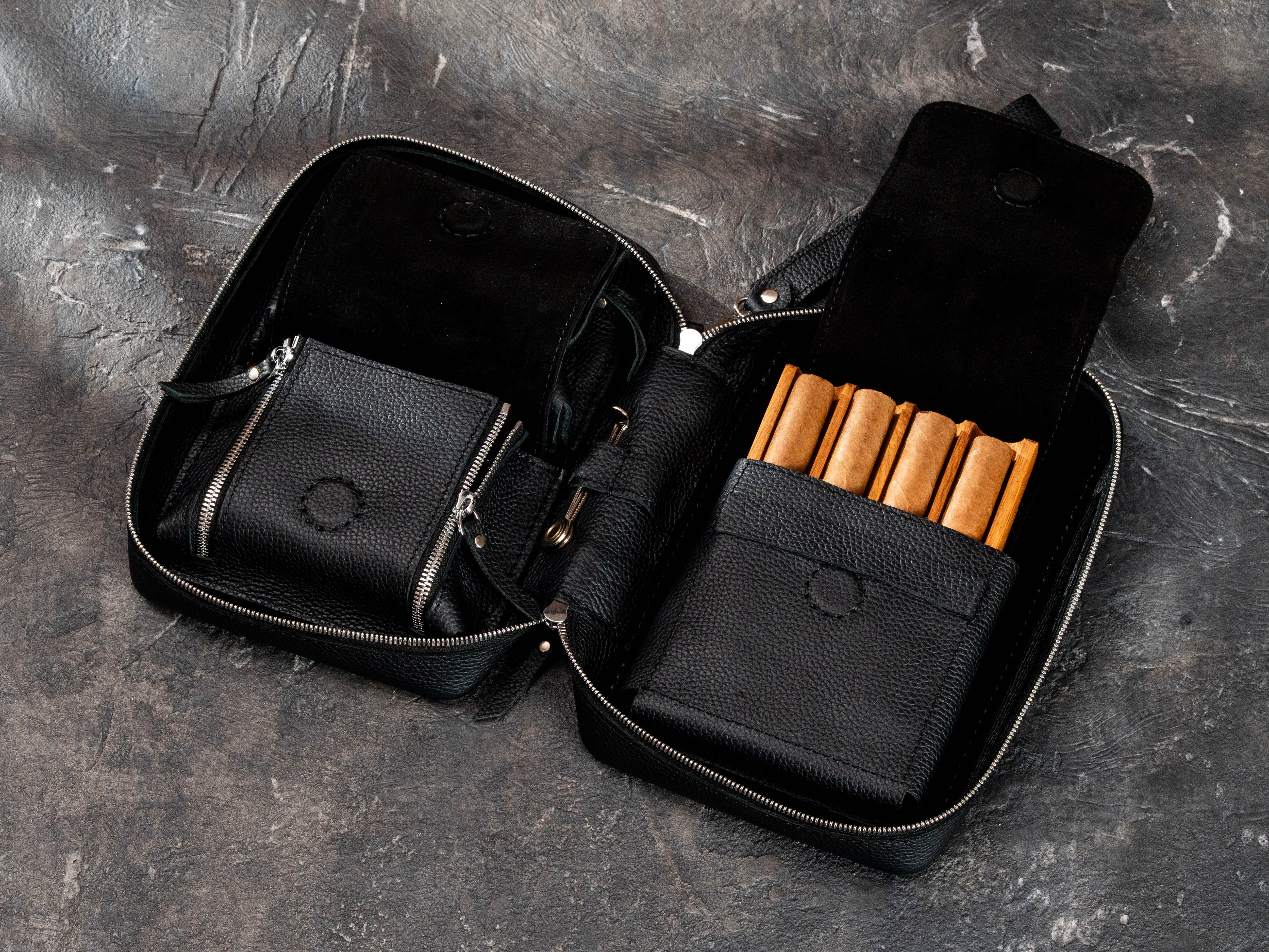Premium cigar accessories case with removable oak cigar tray, zippered pockets, elastic holders and compartments for lighter and cutter.