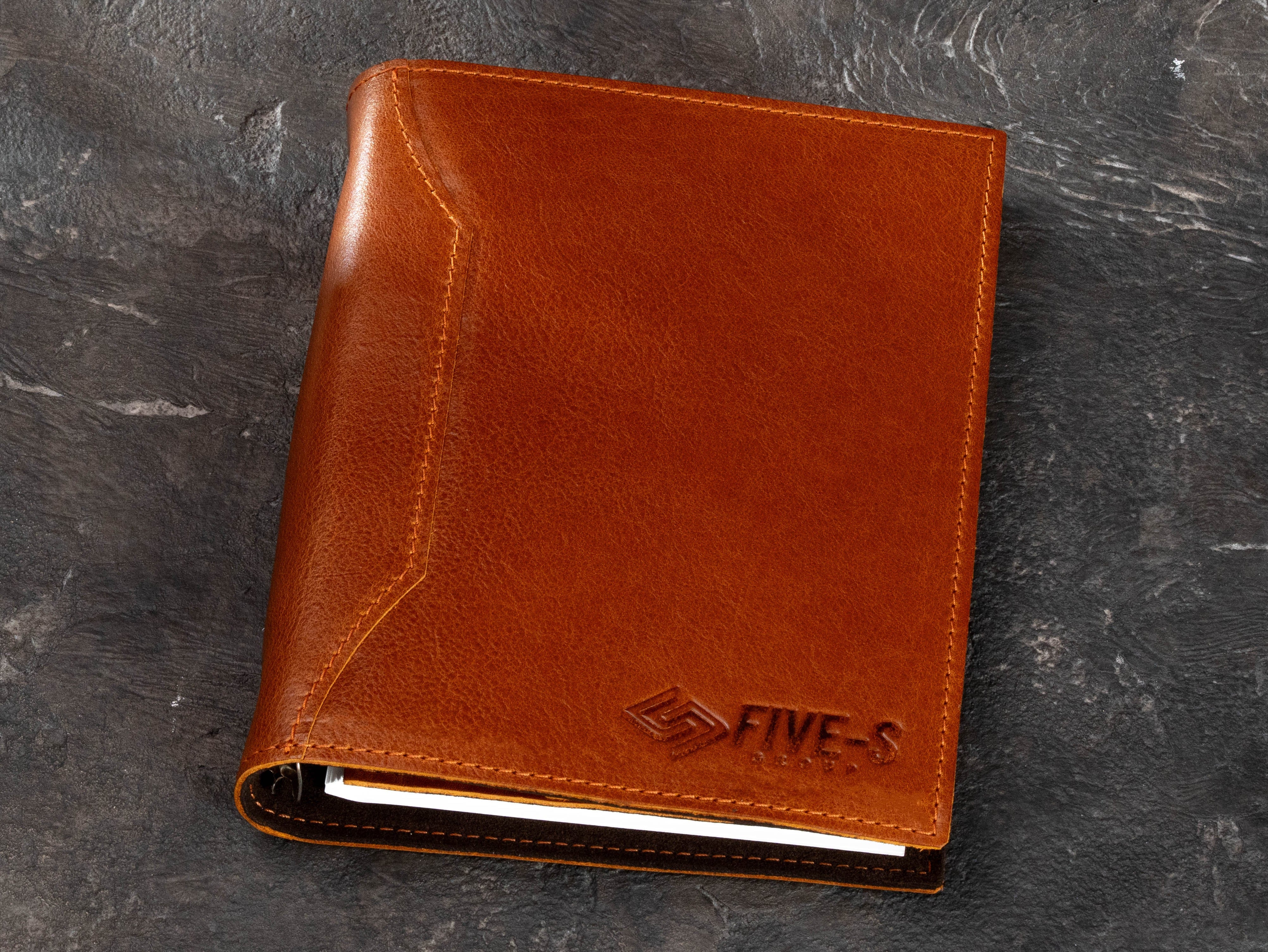 Camel leather refillable journal binder with custom FIVE-S corporate logo, stitched cover and professional 6-ring notebook design.