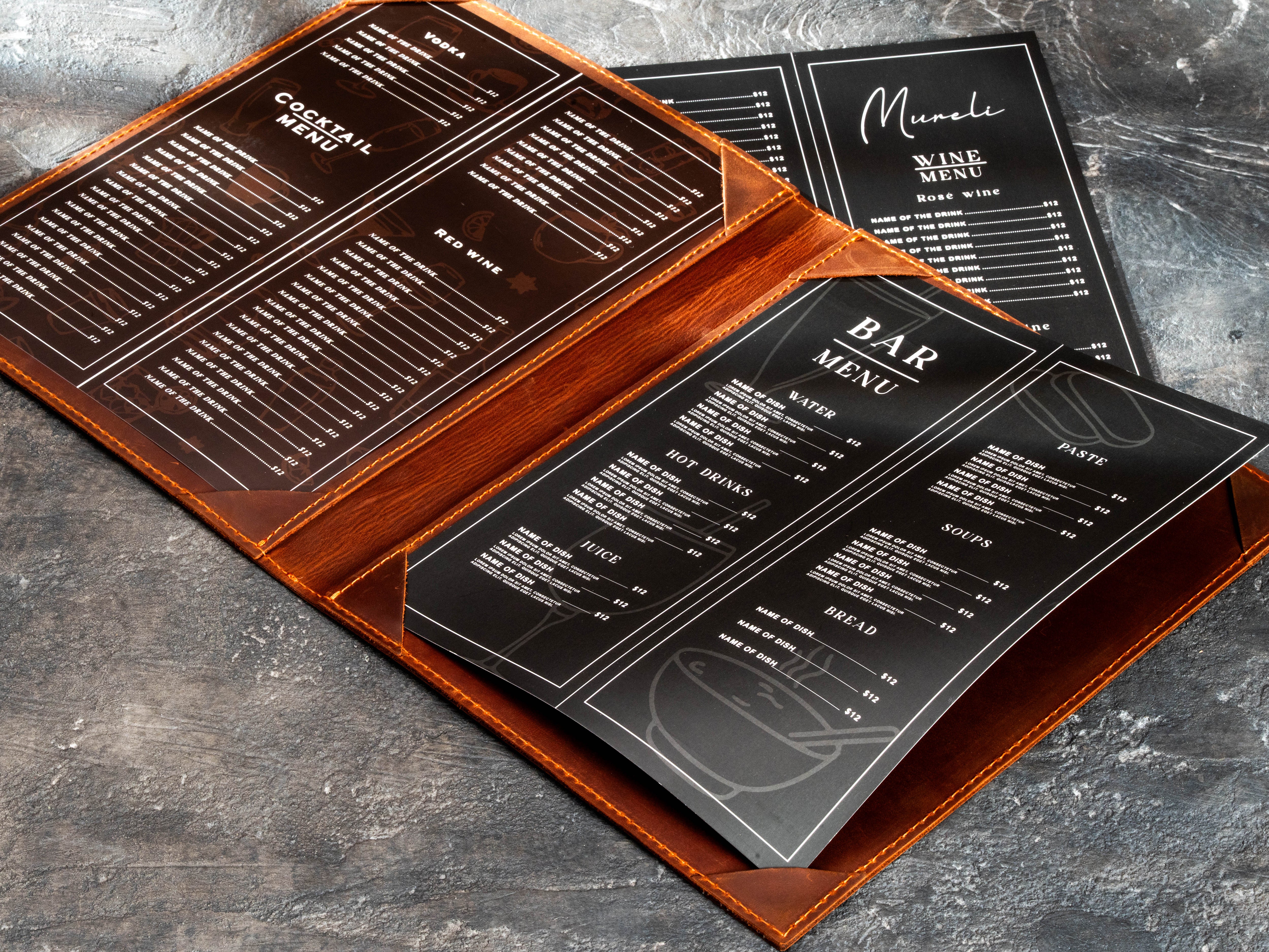 Open double-layer leather restaurant menu folder with straight corner holders securing 8.5 × 11 inch menu sheets.