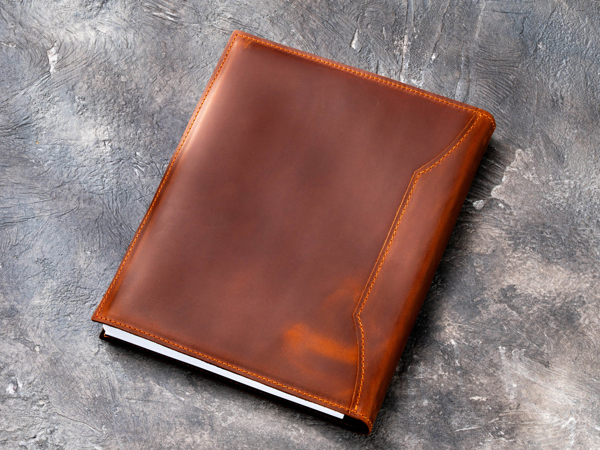 Back view of copper brown leather portfolio binder with stitched structured cover