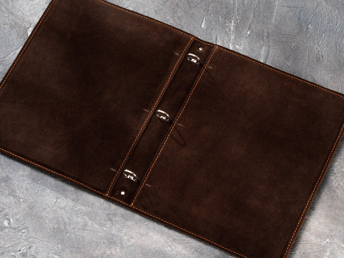 Open leather 3-ring portfolio binder with dark brown suede interior for presentation documents
