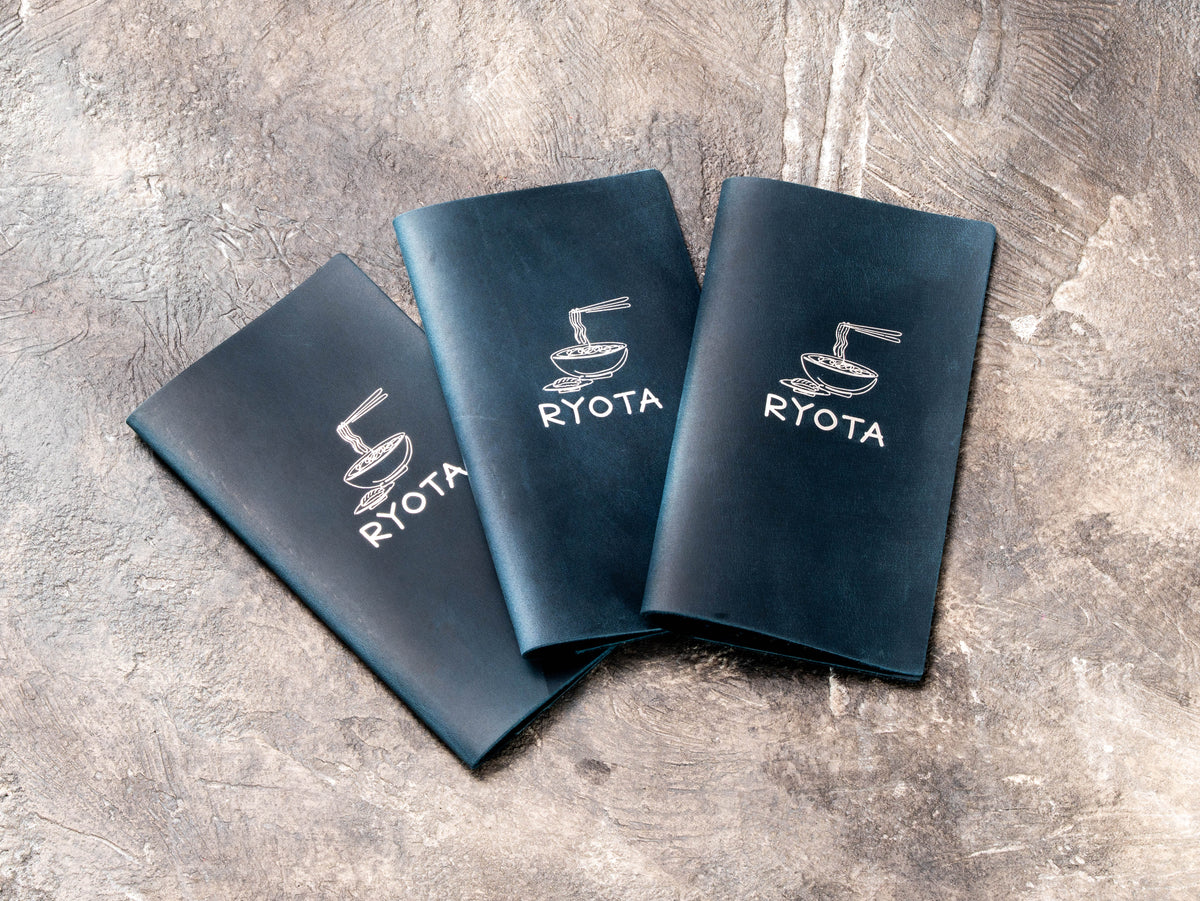 Branded leather bill holders for Japanese ramen and sushi restaurant in Chicago
