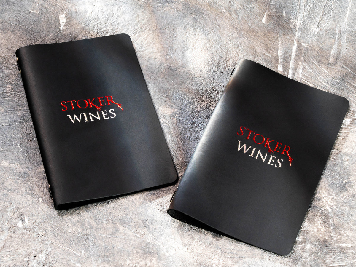 Custom black leather wine menu covers with two-color foil logo personalization