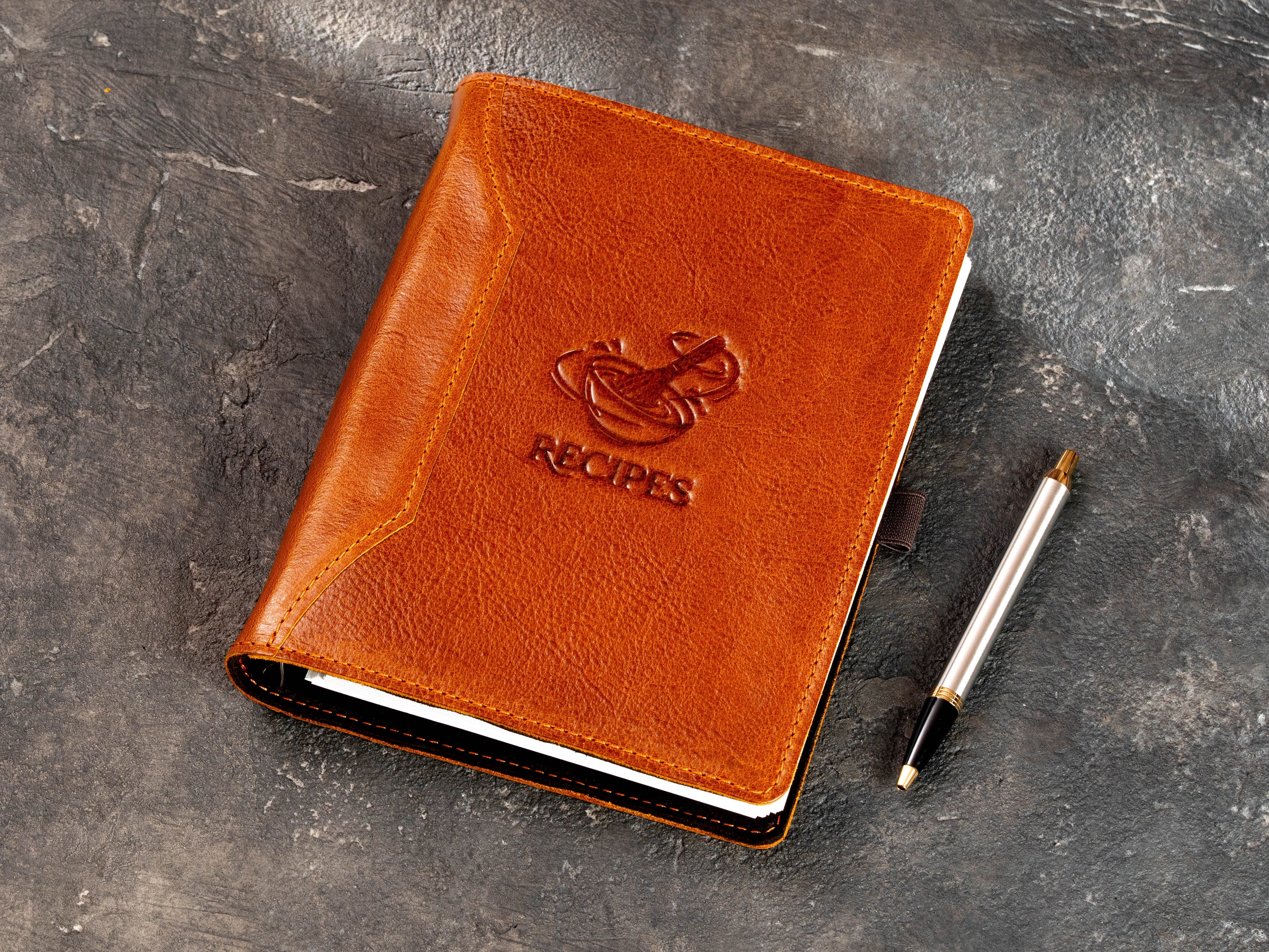 Camel Cagliari leather family recipe organizer with embossed RECIPES design and pen