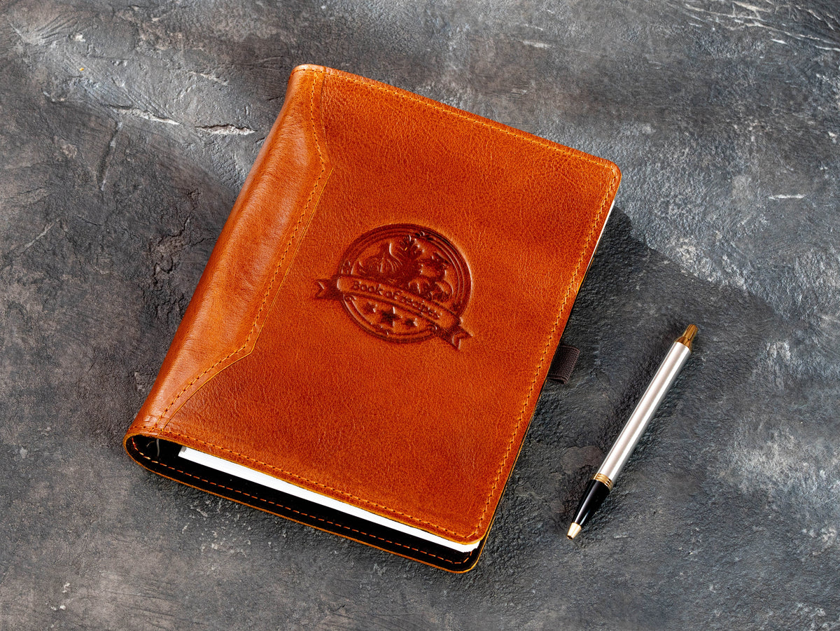 Personalized camel leather cookbook organizer with Book of Recipes design and pen loop