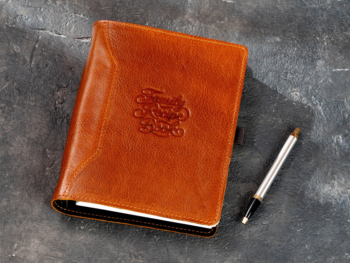 Camel leather family recipe book organizer with embossed Family Recipe Book design and pen