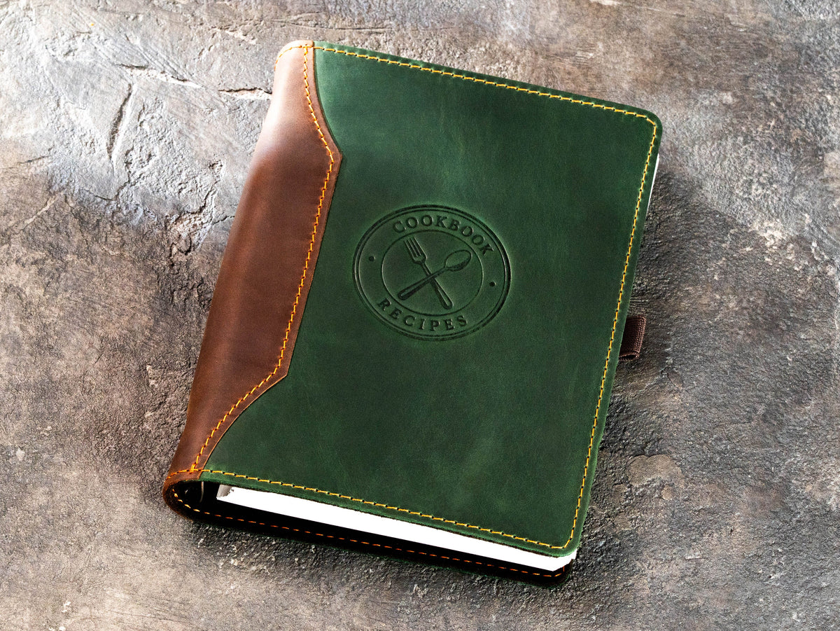 Two-tone green leather recipe binder with fixed Cookbook Recipes emblem and refillable pages