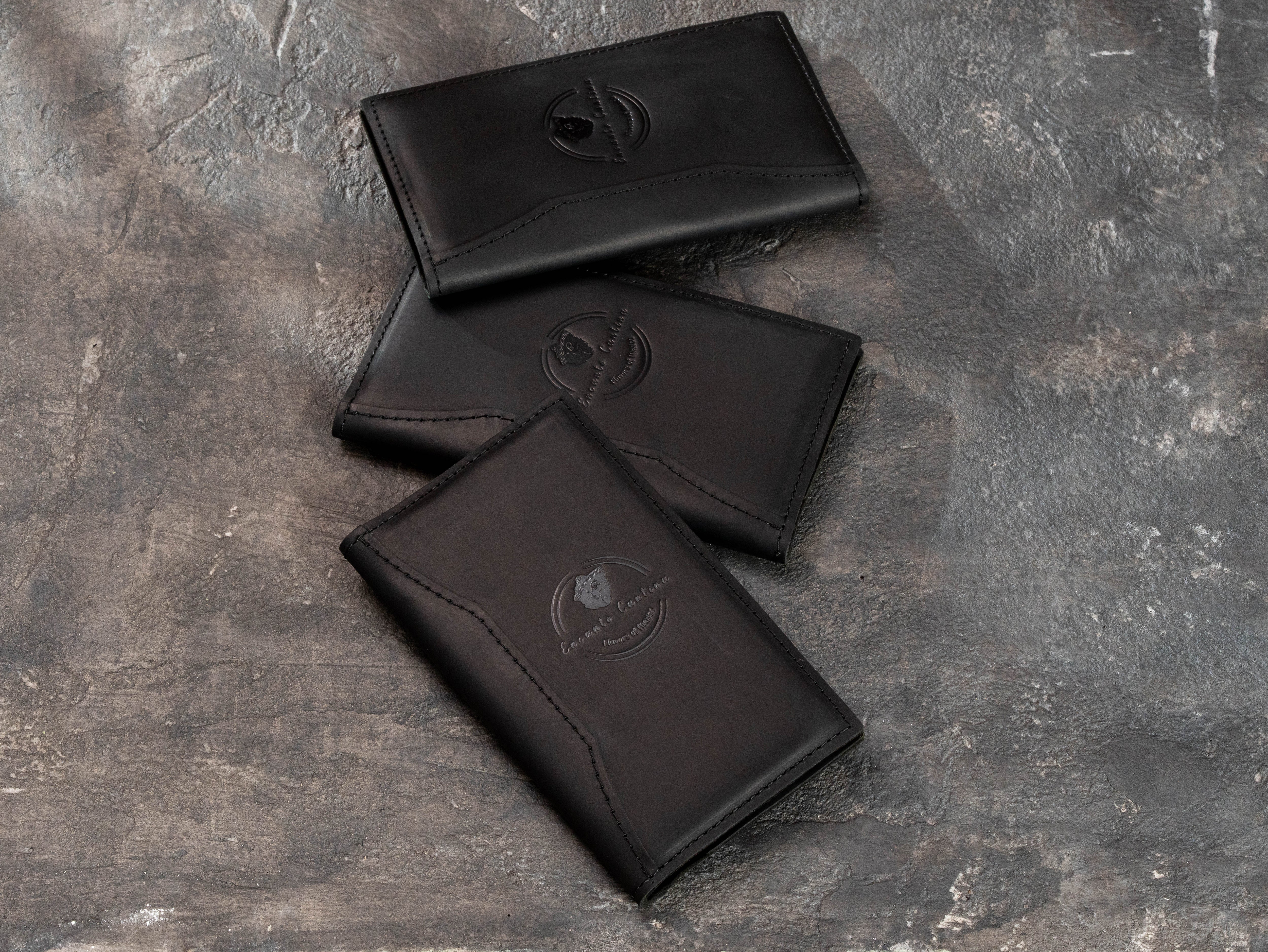 Black leather Mexican restaurant check presenters made with matching custom logo personalization
