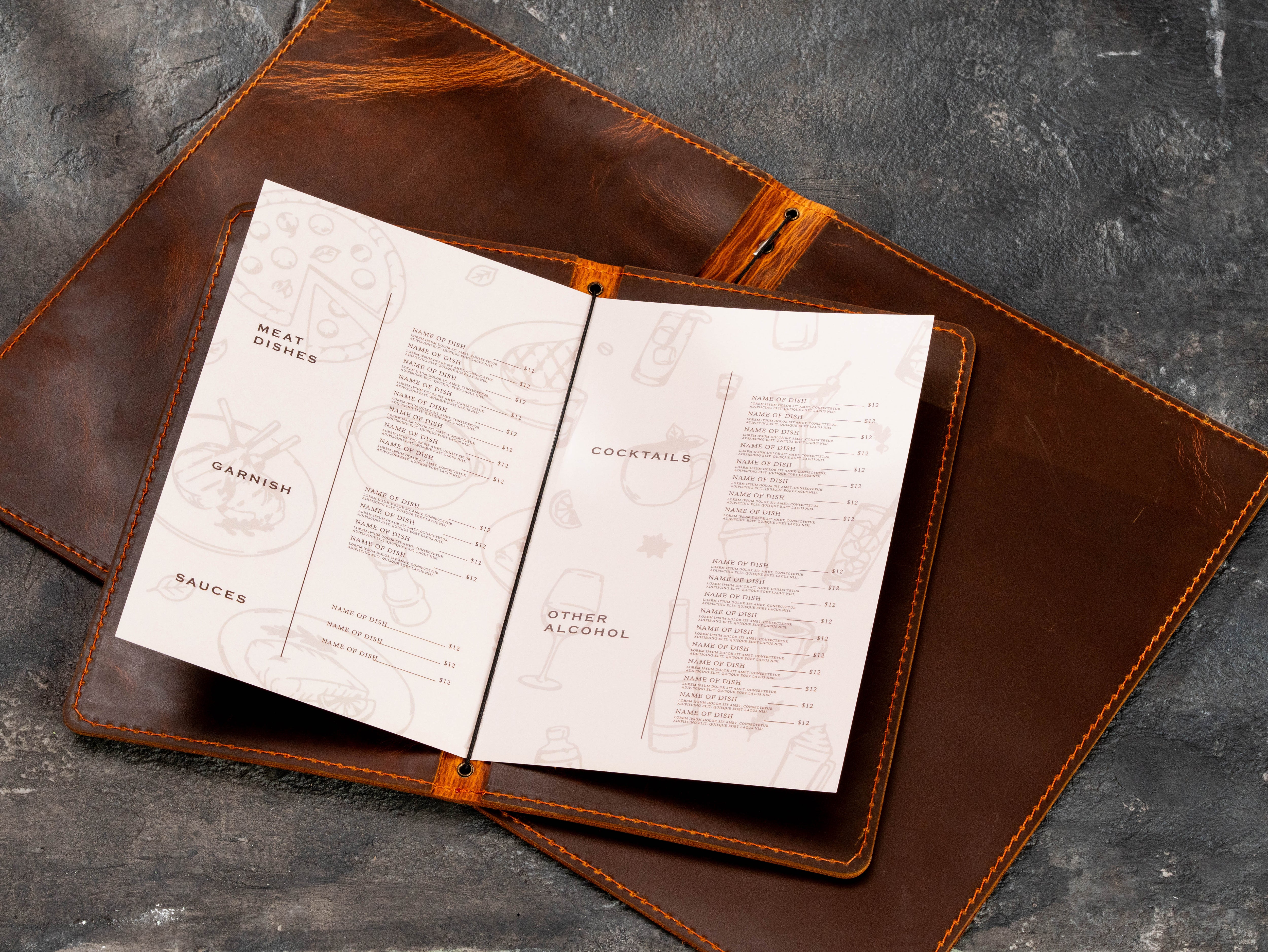 Custom brown leather menu folder with folded cocktail menu insert and elastic cord attachment